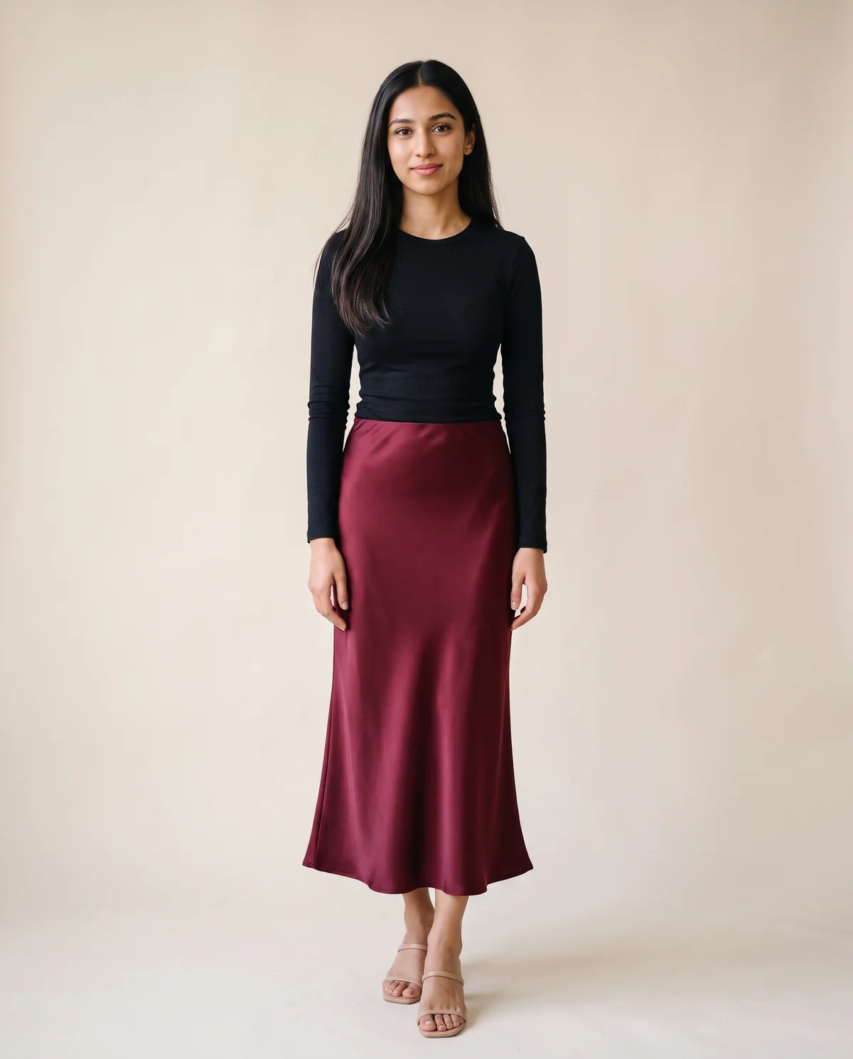 Satin Bias-Cut Midi Skirt in Burgundy, front view, worn by Priya