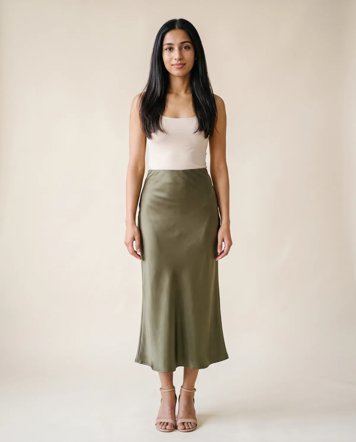 Satin Bias-Cut Midi Skirt in Olive, front view, worn by Priya
