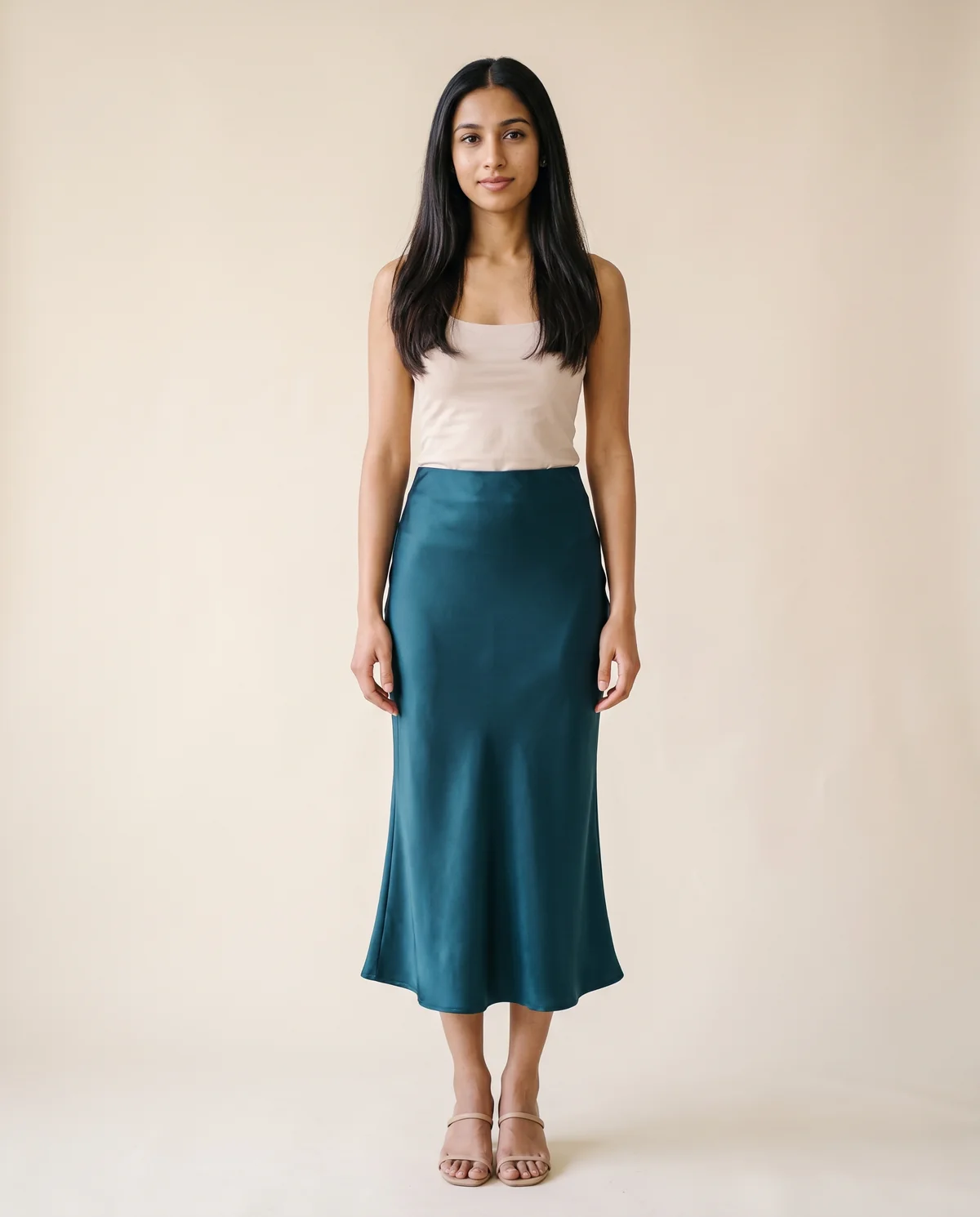 Satin Bias-Cut Midi Skirt in Teal, front view, worn by Priya