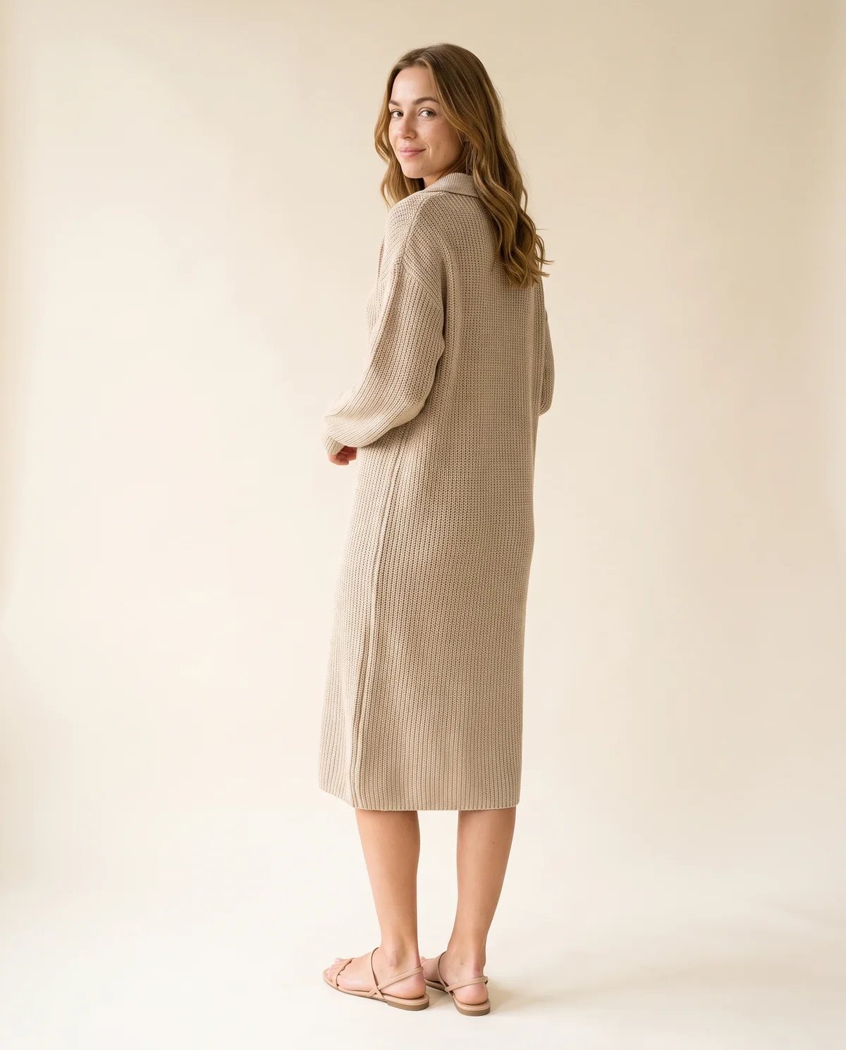 Button-Collar Knit Sweater Midi Dress in Oatmeal, back view, worn by Ava