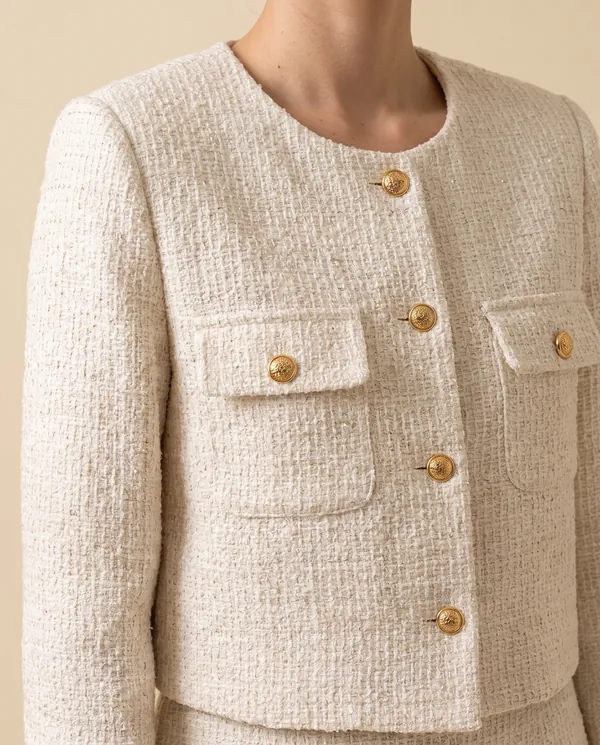 Cropped Tweed Jacket with Gold Buttons in Cream, close-up of the detail