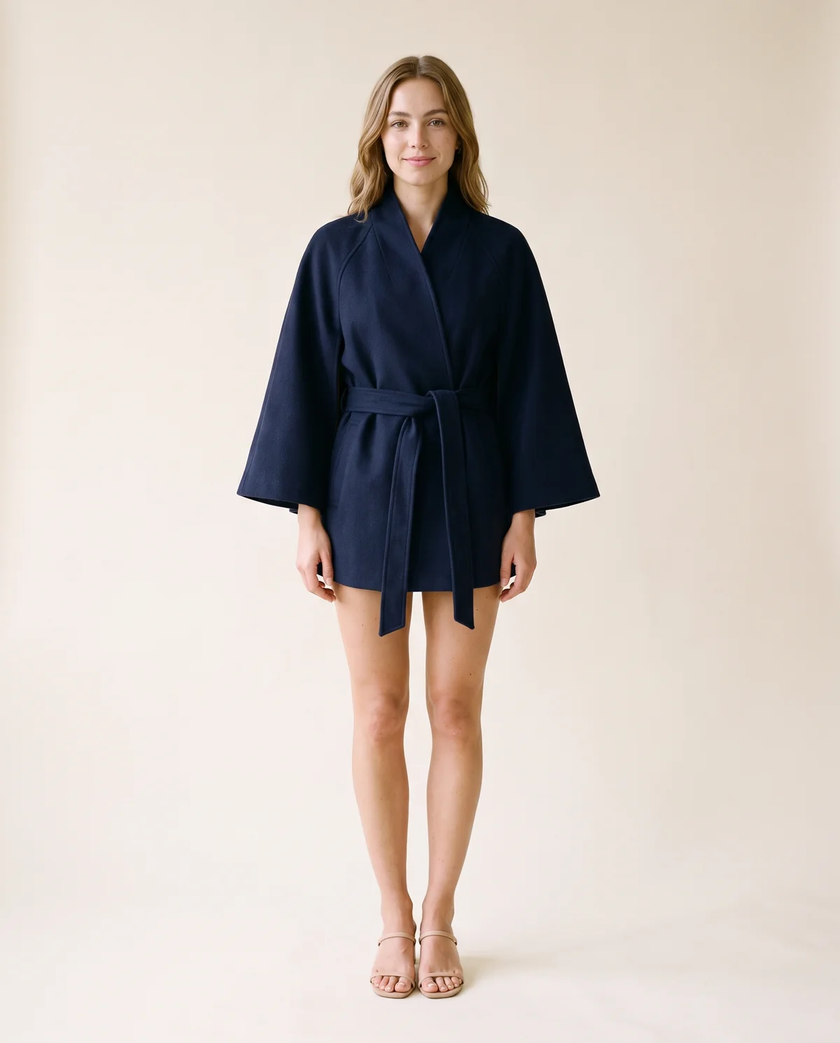 Belted Cape Jacket in Navy, front view, worn by Ava