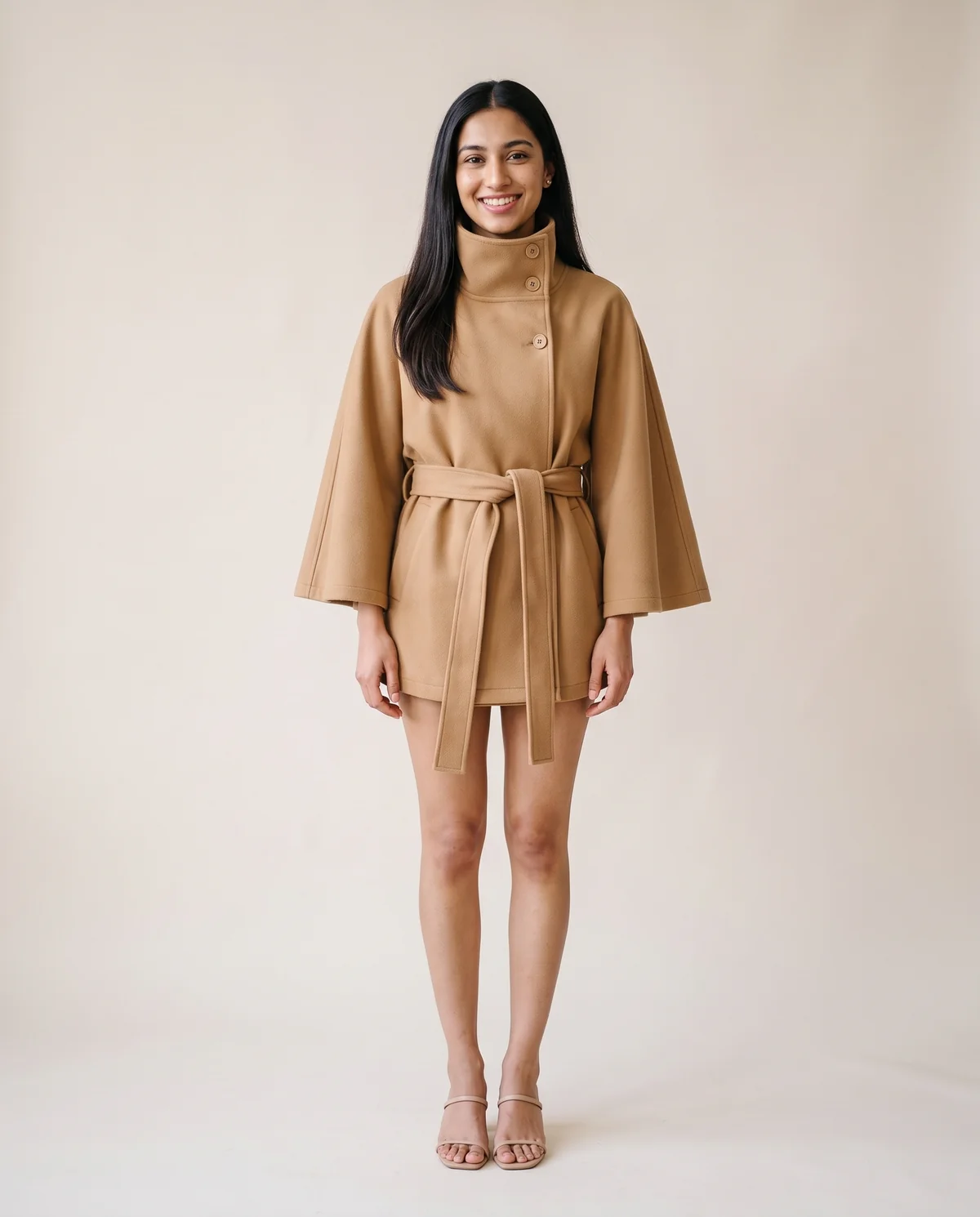 Belted Cape Jacket in Camel, front view, worn by Priya