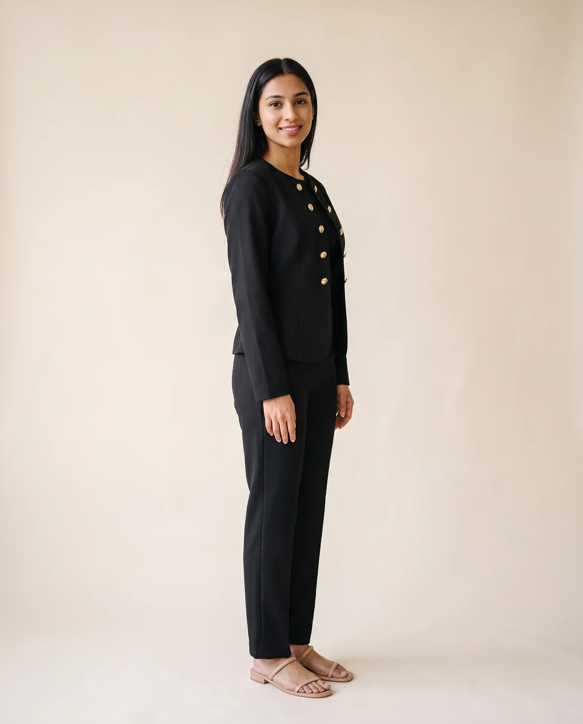 Round-Neck Double-Breasted Jacket in Black, side view, worn by Priya