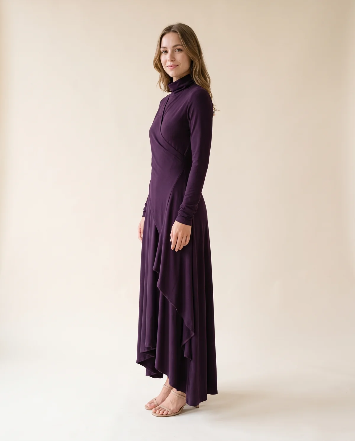 High-Neck Long-Sleeve Draped Maxi Dress in Plum, side view, worn by Ava