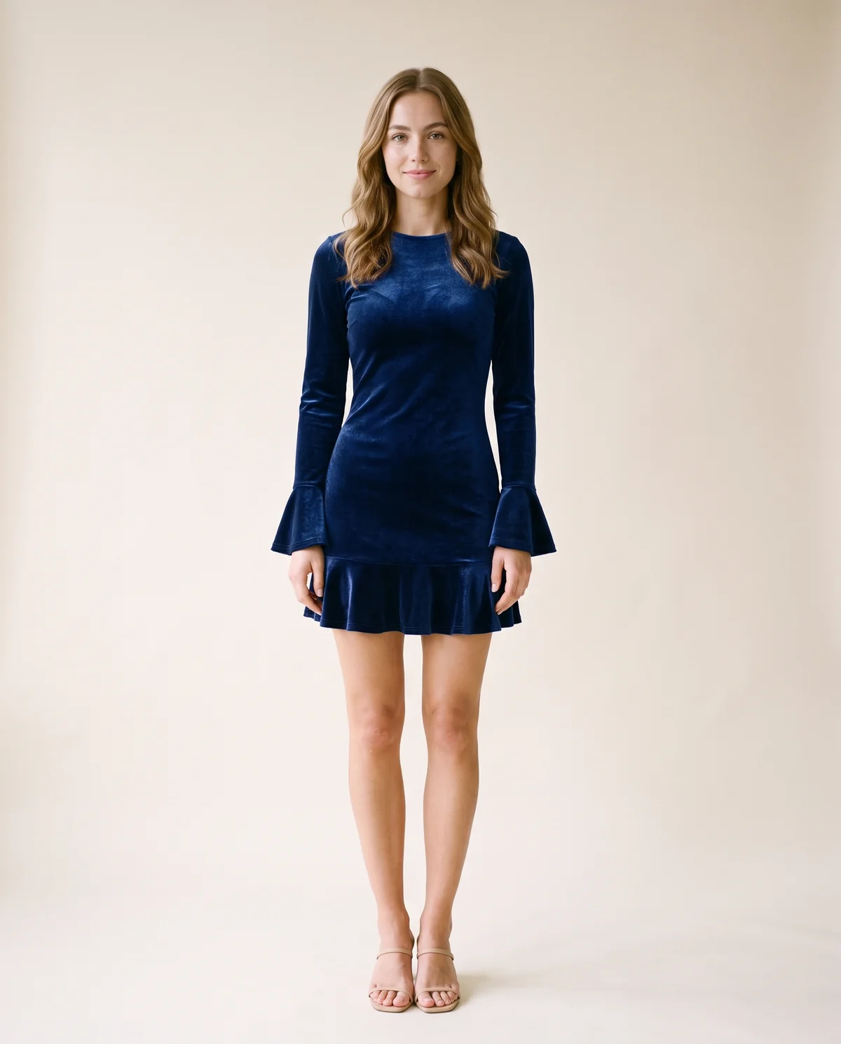Velvet Ruffle-Hem Long-Sleeve Mini Dress in Navy, front view, worn by Ava