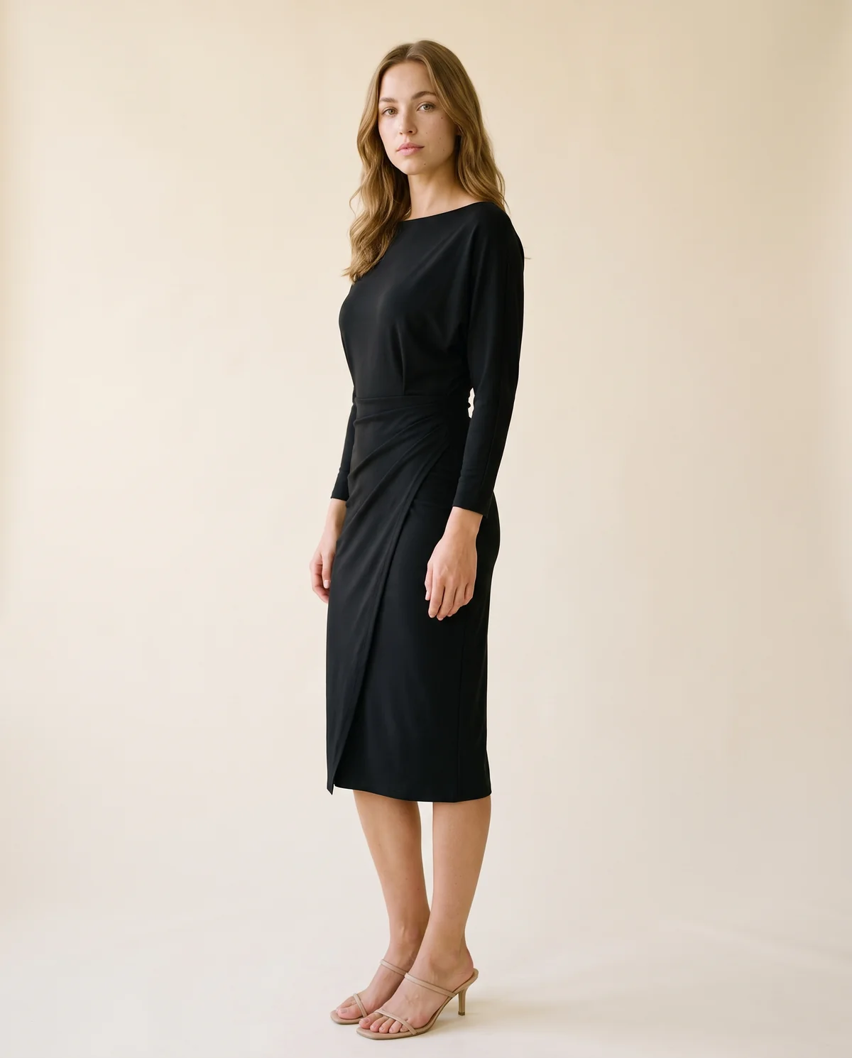 Boat-Neck Wrap-Skirt Sheath Midi Dress in Black, side view, worn by Ava