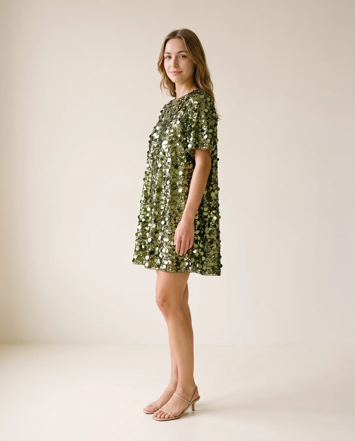 Oversized Sequin Mini Tee Dress in Green, side view, worn by Ava