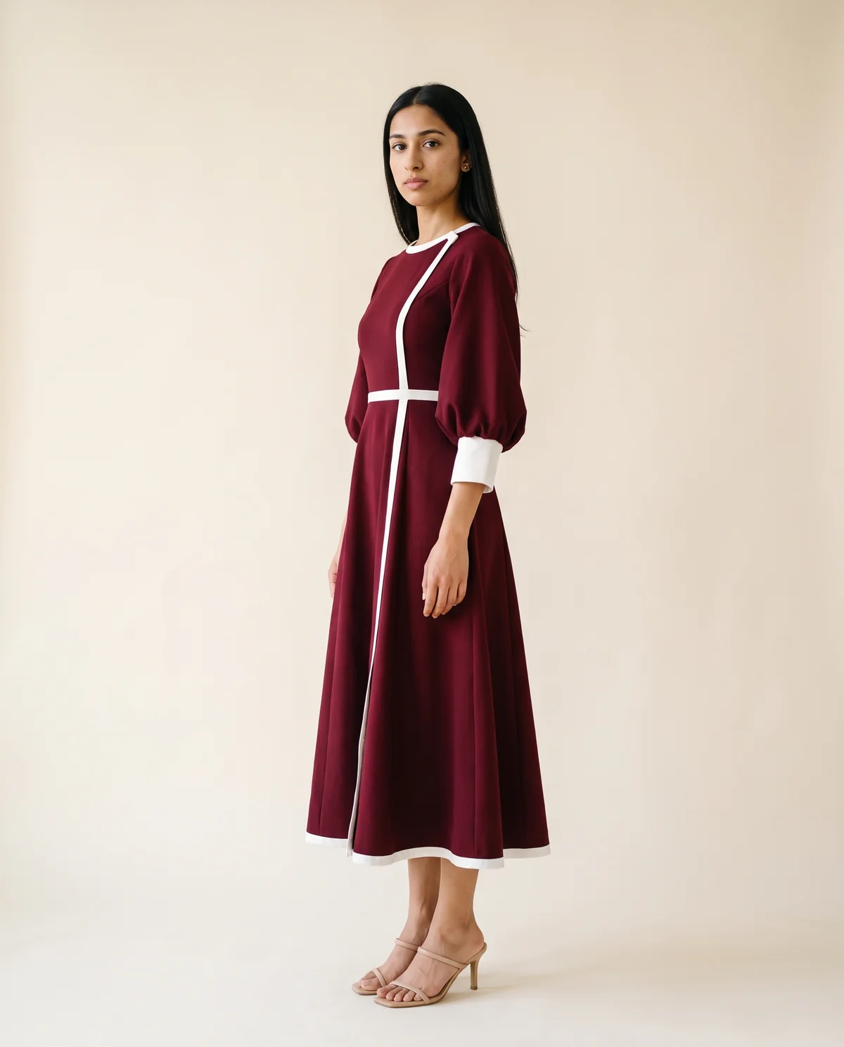 Contrast-Trim Fit-and-Flare Midi Dress in Wine, side view, worn by Priya