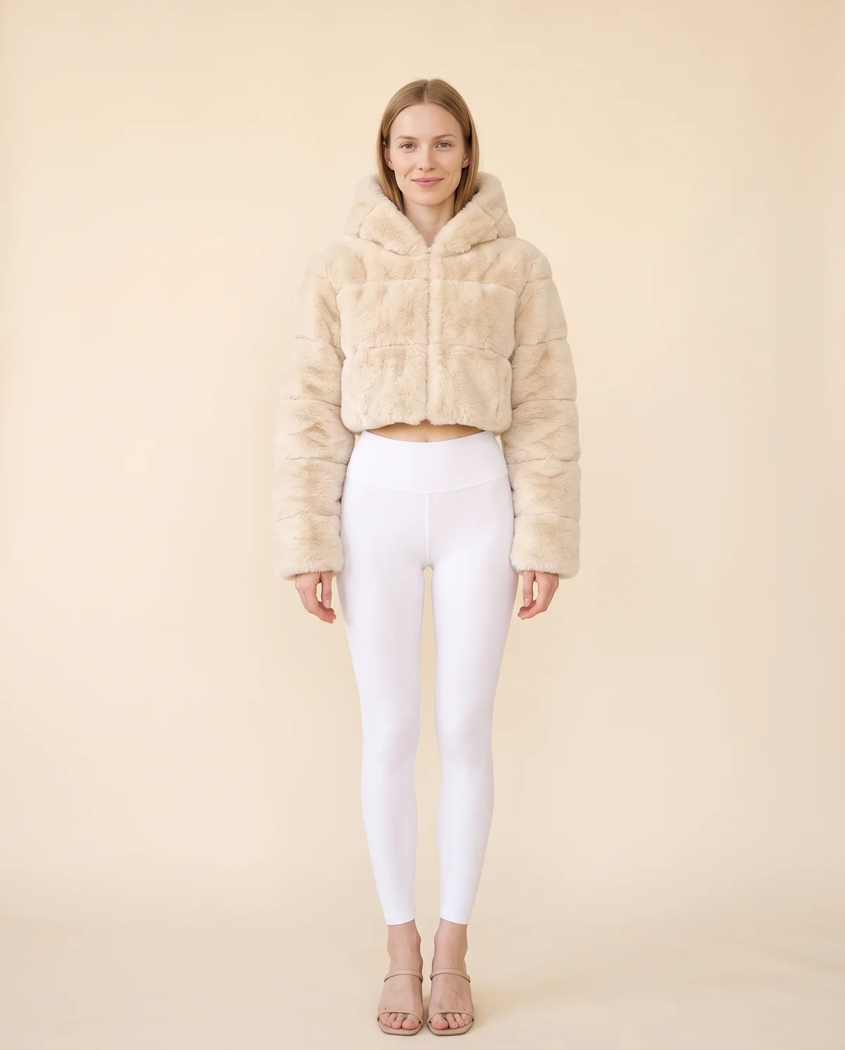 Hooded Cropped Faux Fur Jacket in Cream, front view, worn by Maya