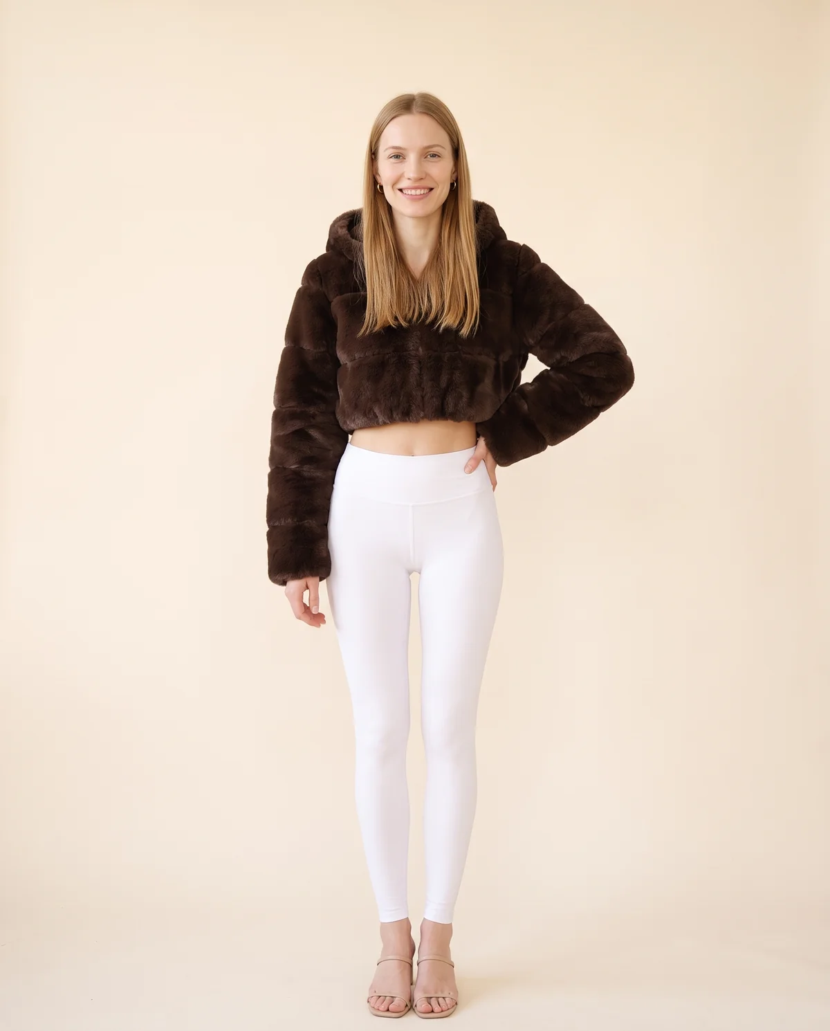 Hooded Cropped Faux Fur Jacket in Chocolate, front view, worn by Maya