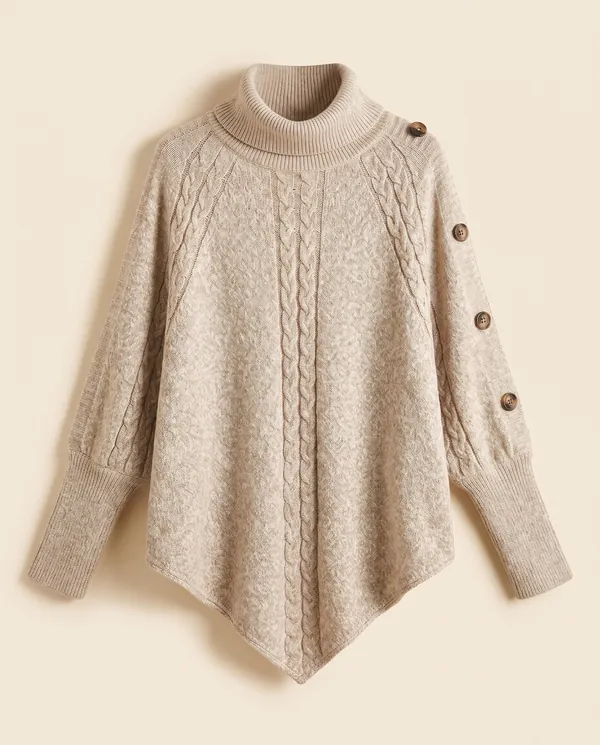 Cable Knit Roll Neck Button Cape Jumper in Oatmeal, product shot on a plain background