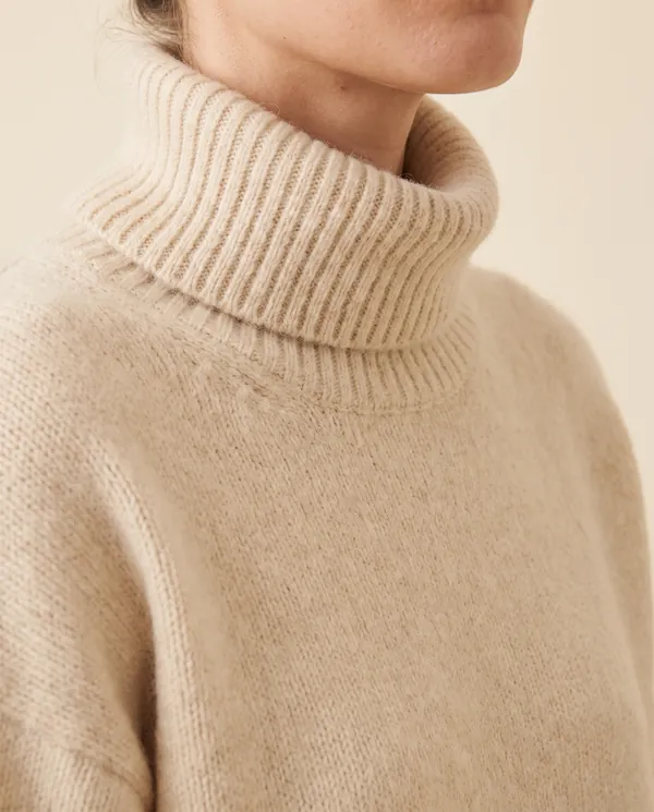 Soft Knit Roll Neck Jumper in Cream, close-up of the detail