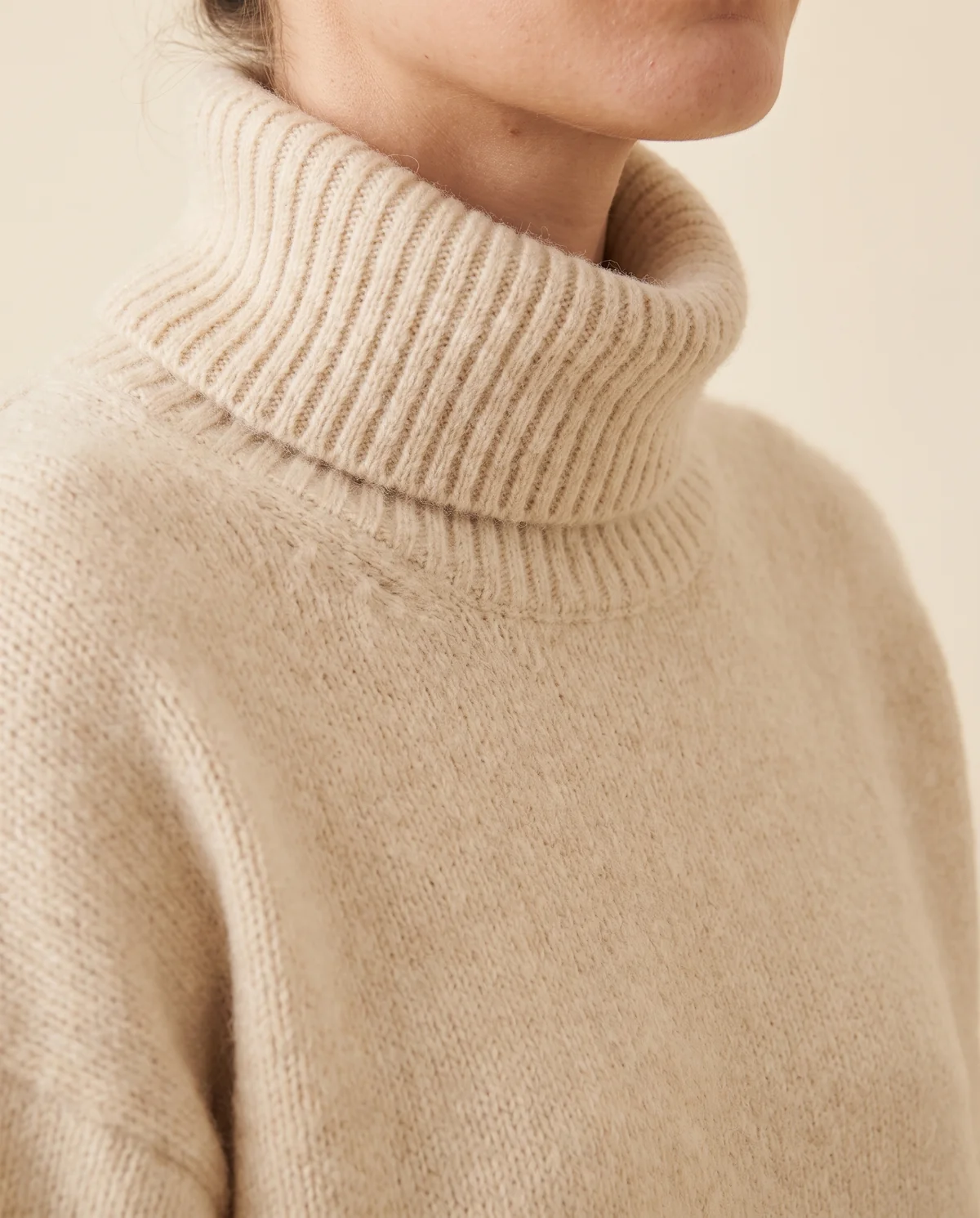 Soft Knit Roll Neck Jumper in Cream, close-up of the detail