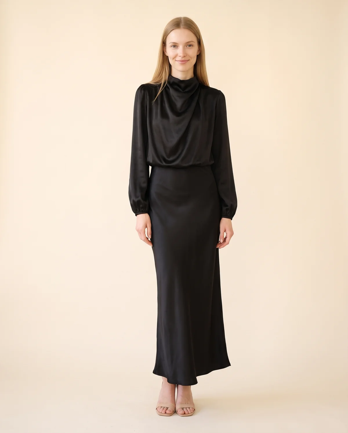 Satin Cowl-Neck Long-Sleeve Column Maxi in Black, front view, worn by Maya