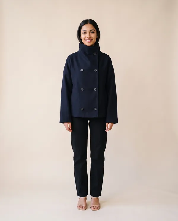 Navy Double-Breasted Short Jacket in Navy, front view, worn by Priya