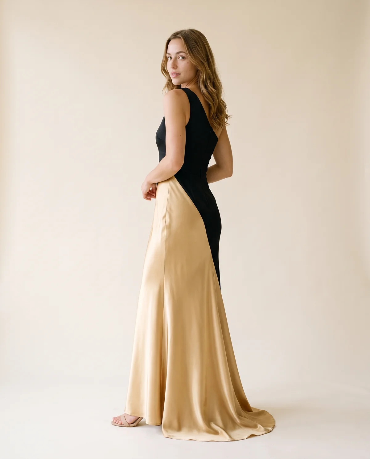Colour-Block Satin One-Shoulder Maxi Dress in Black and Gold, back view, worn by Ava