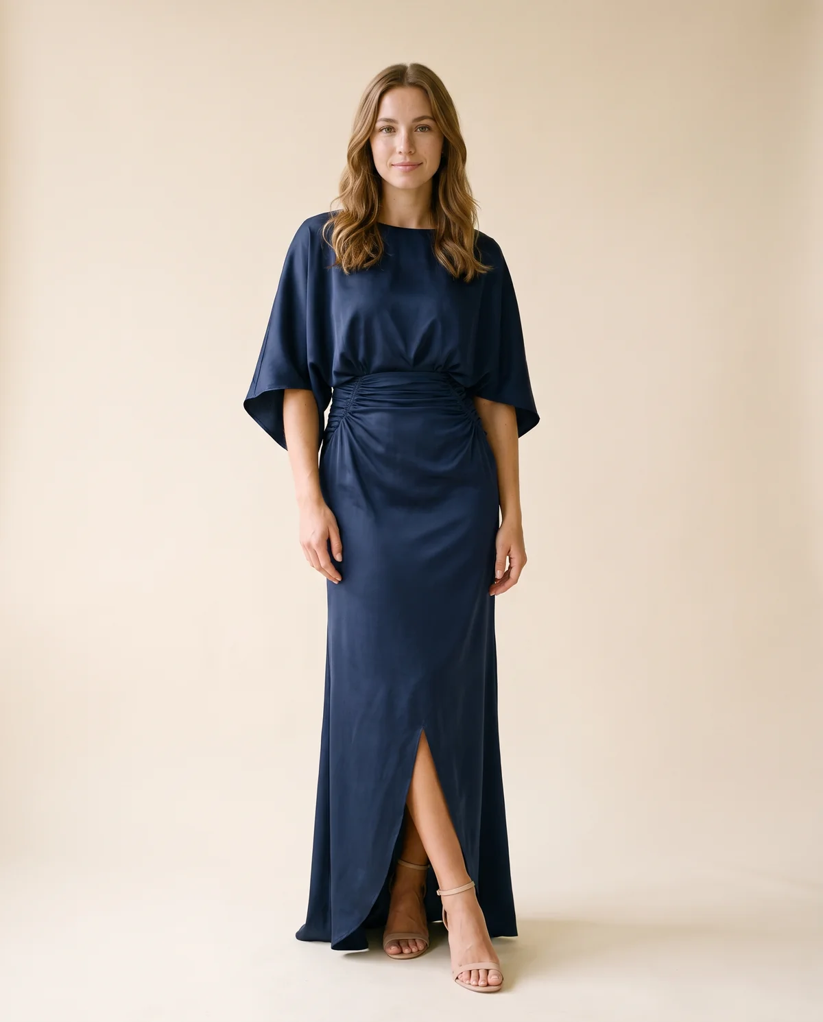 Satin Batwing-Sleeve Maxi Dress with Slit in Navy, front view, worn by Ava