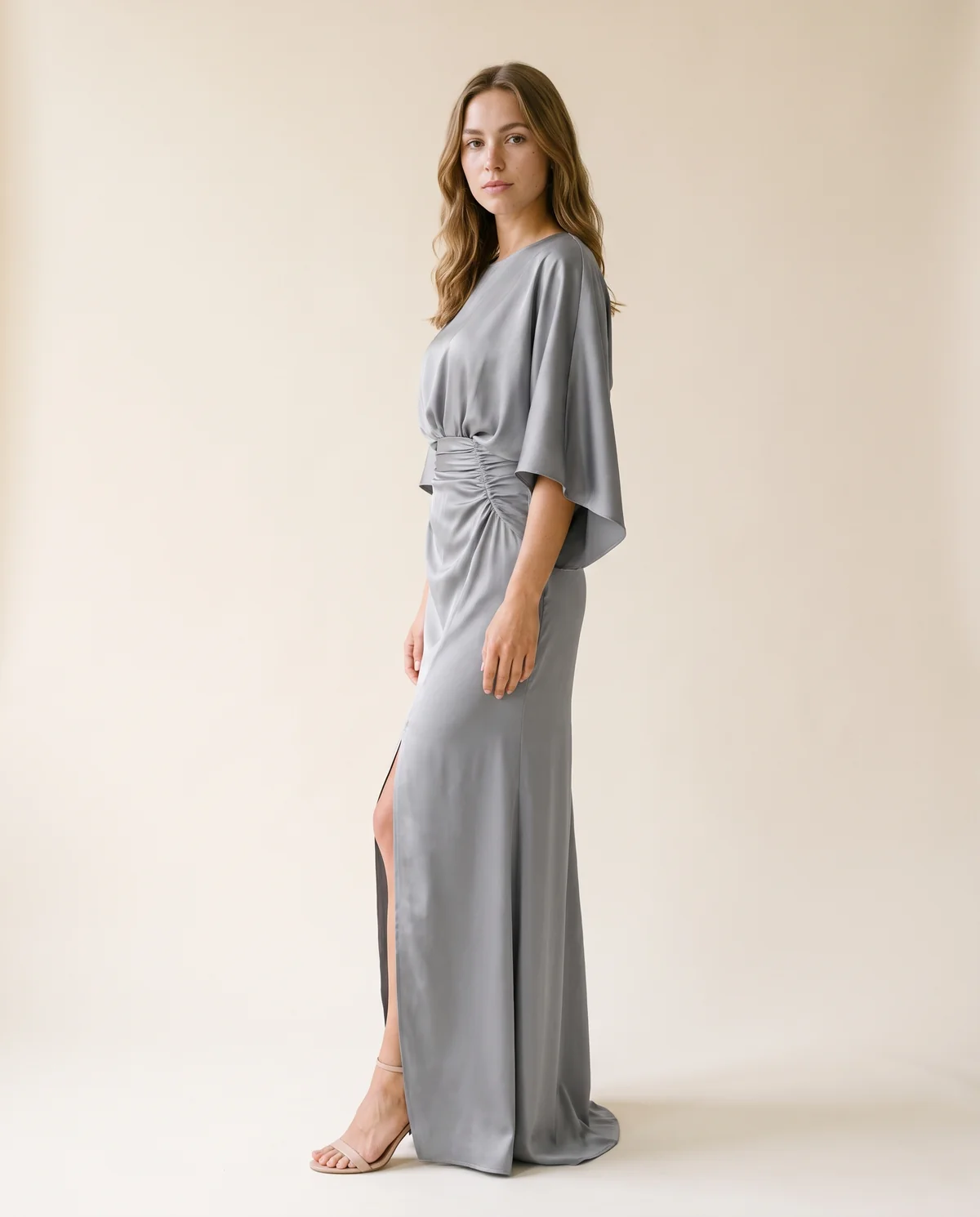Satin Batwing-Sleeve Maxi Dress with Slit in Grey, side view, worn by Ava