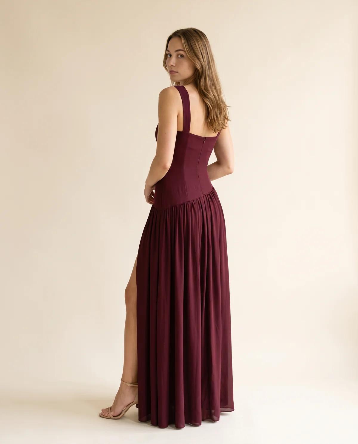 Square-Neck Pleated Slit Maxi Dress in Wine, back view, worn by Ava
