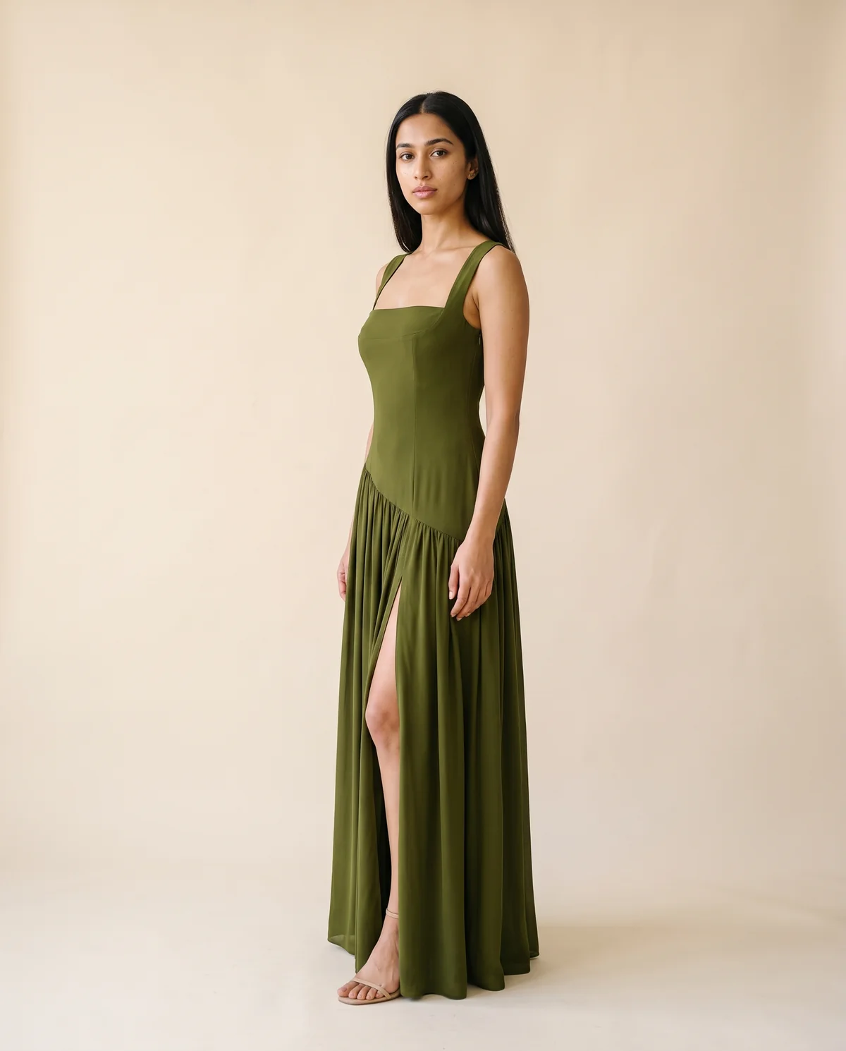 Square-Neck Pleated Slit Maxi Dress in Olive, side view, worn by Priya