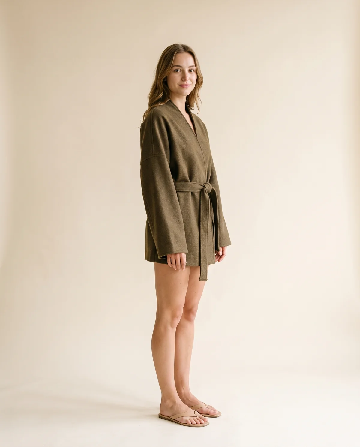 Collarless Wrap Jacket in Olive Brown, side view, worn by Ava