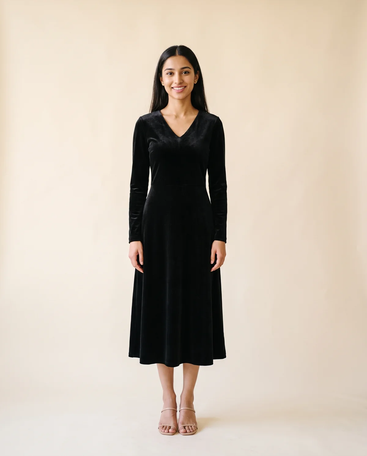 Velvet V-Neck Little Black Midi Dress in Black, front view, worn by Priya