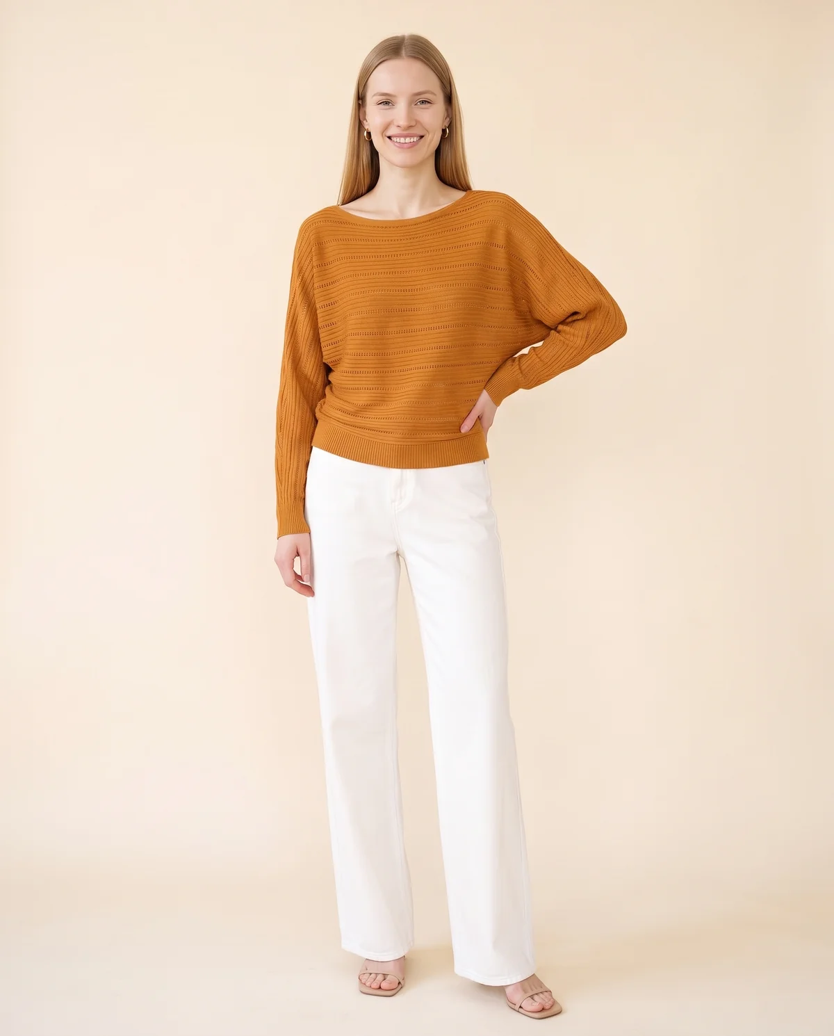 Batwing Pointelle Boat Neck Jumper in Caramel, front view, worn by Maya