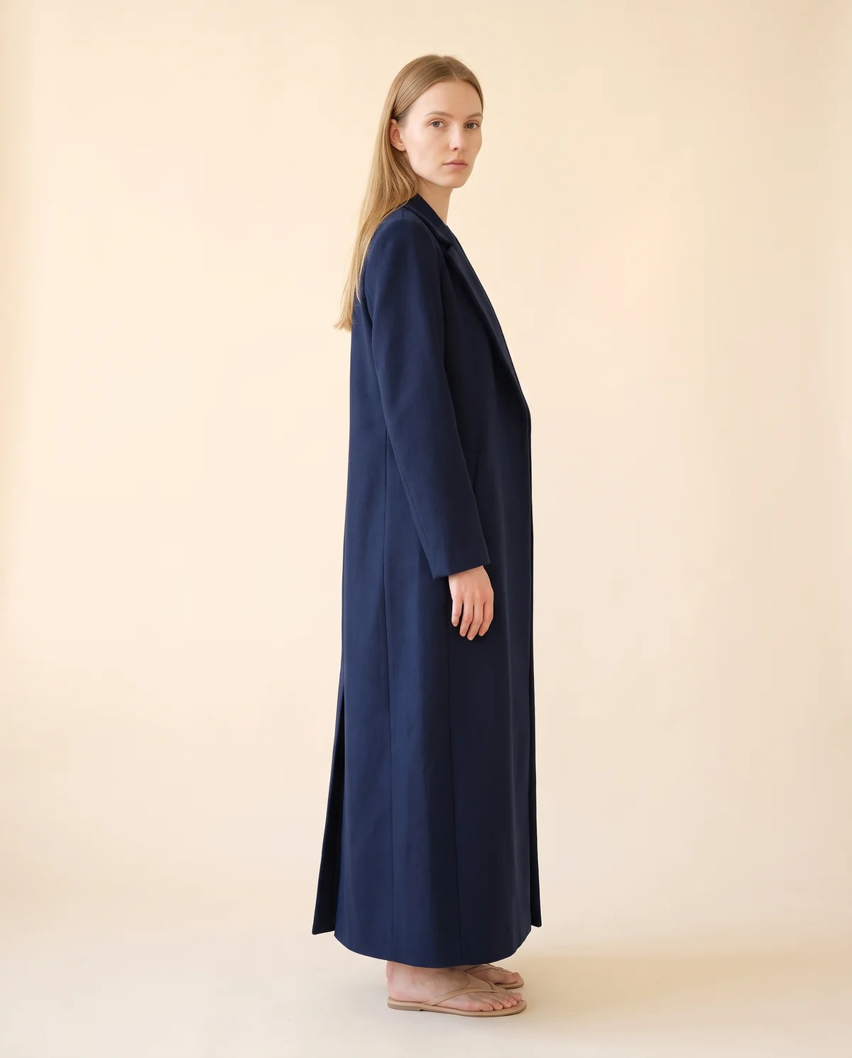 Extra-Long Wool-Look Coat with Back Vent in Navy, side view, worn by Maya