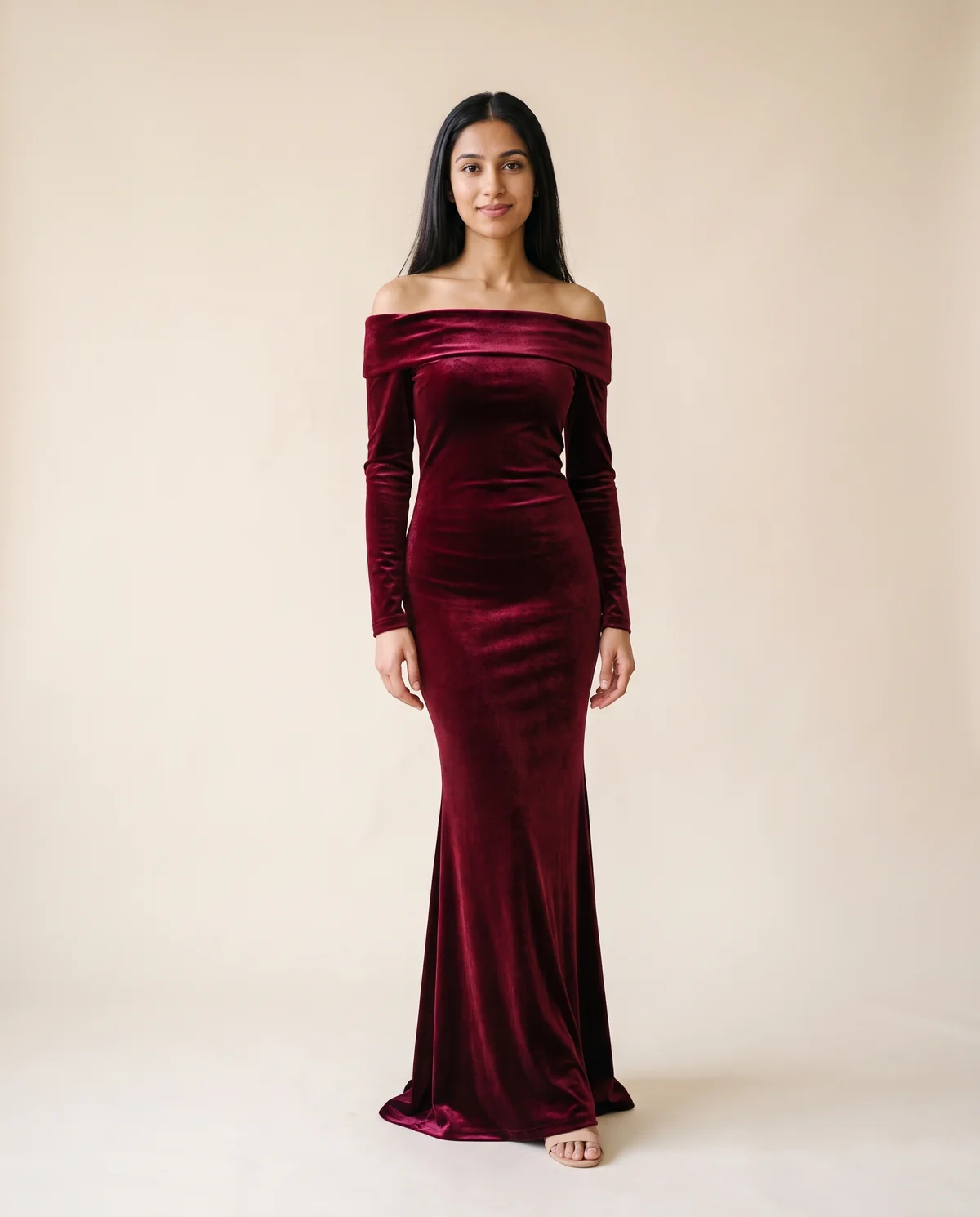 Velvet Off-Shoulder Long-Sleeve Mermaid Maxi in Wine, front view, worn by Priya