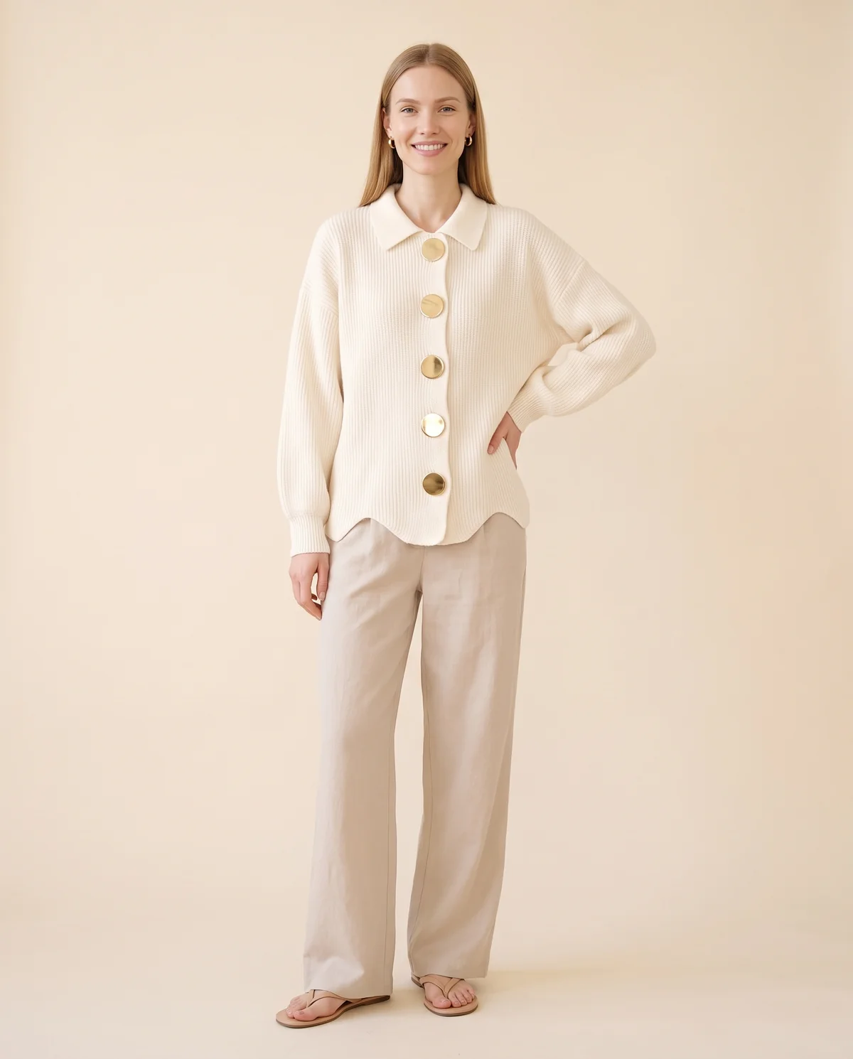 Collared Cardigan with Gold Buttons in Cream, front view, worn by Maya