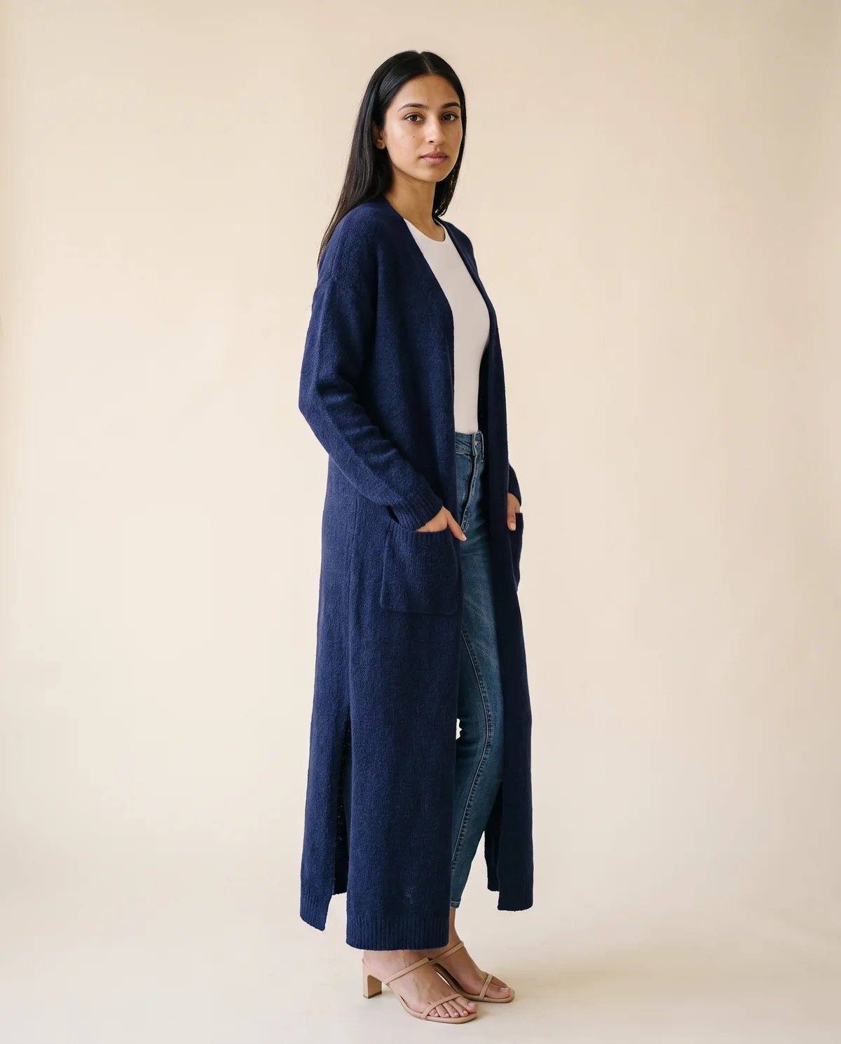 Long Open-Front Cardigan with Side Slits in Navy, side view, worn by Priya