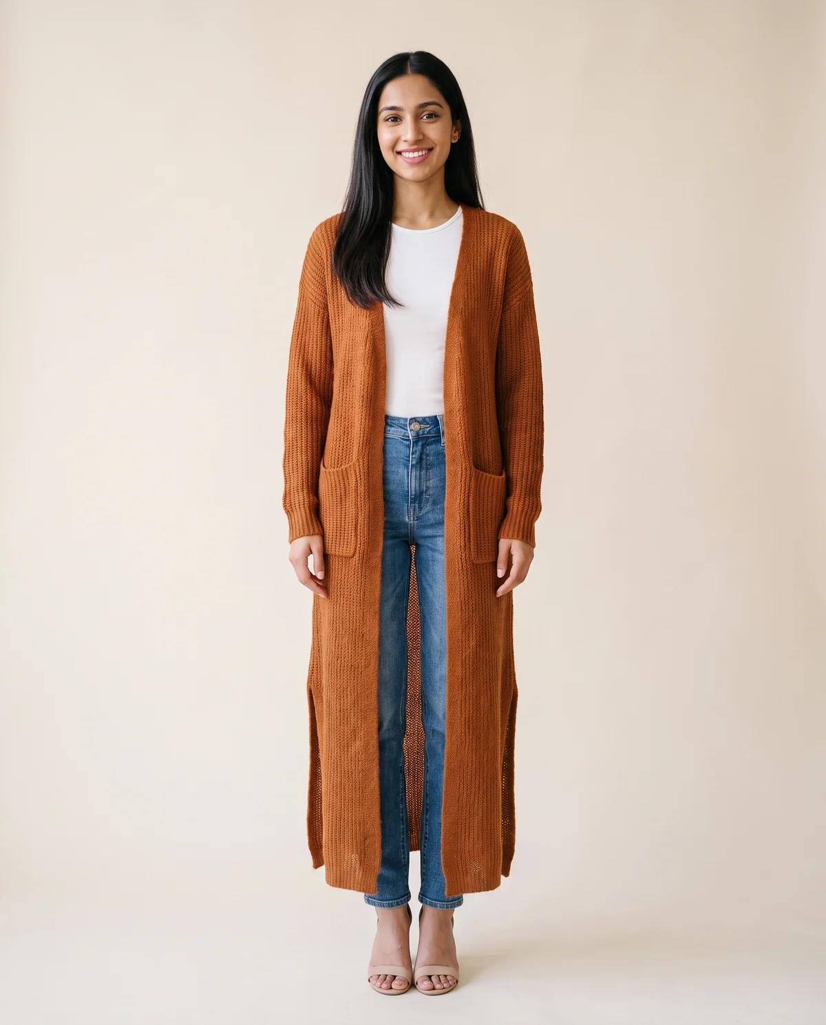 Long Open-Front Cardigan with Side Slits in Rust, front view, worn by Priya