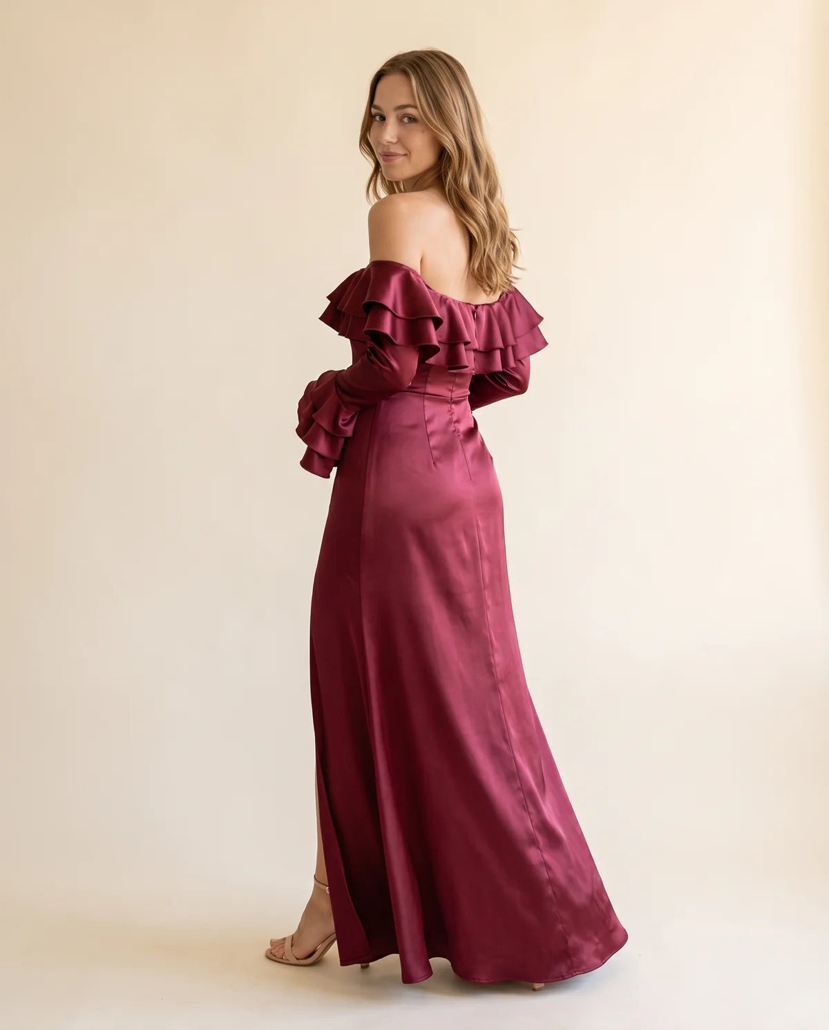 Satin Off-Shoulder Ruffle-Sleeve Maxi Dress in Wine, back view, worn by Ava