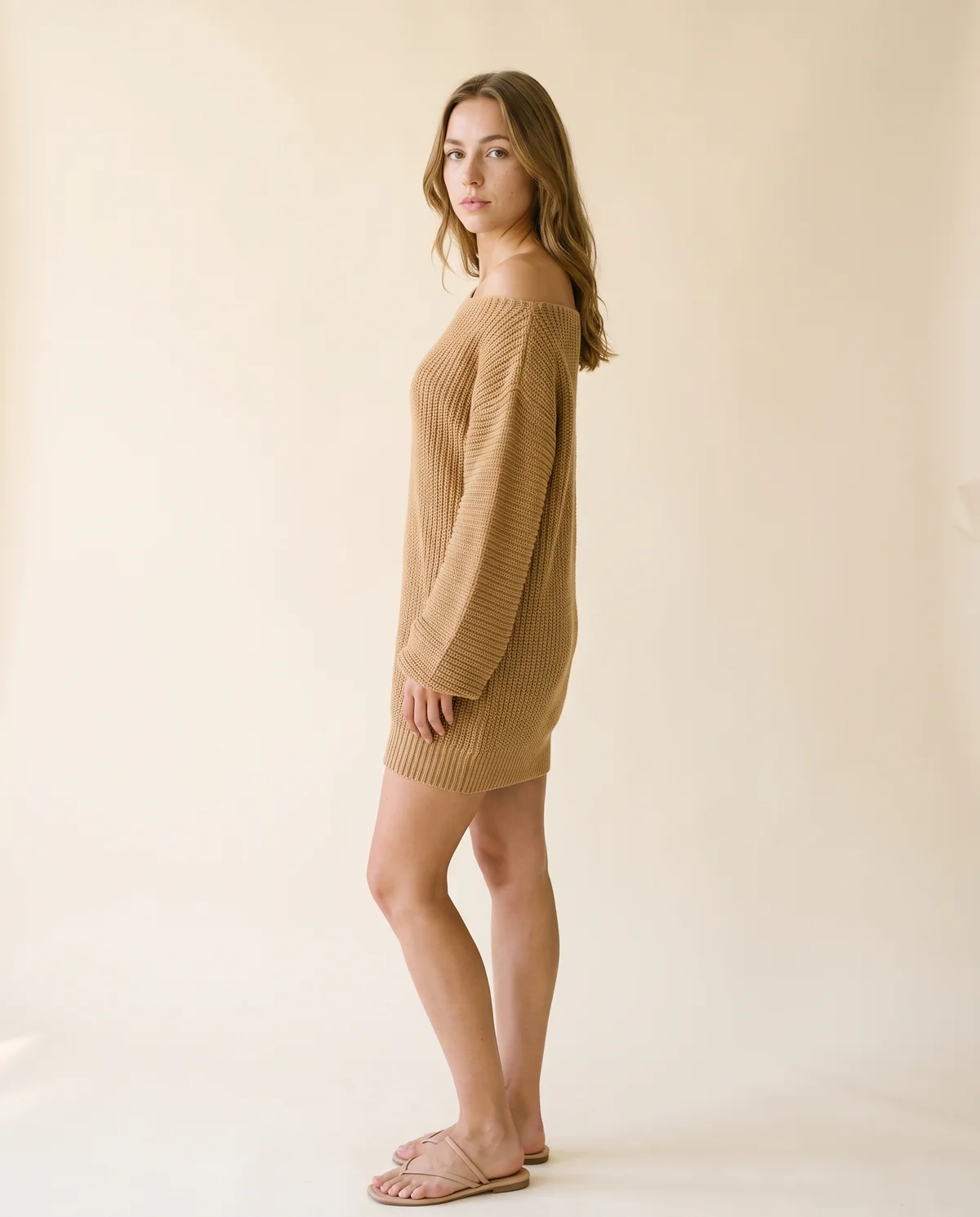 Off-Shoulder Chunky Knit Mini Dress in Camel, side view, worn by Ava