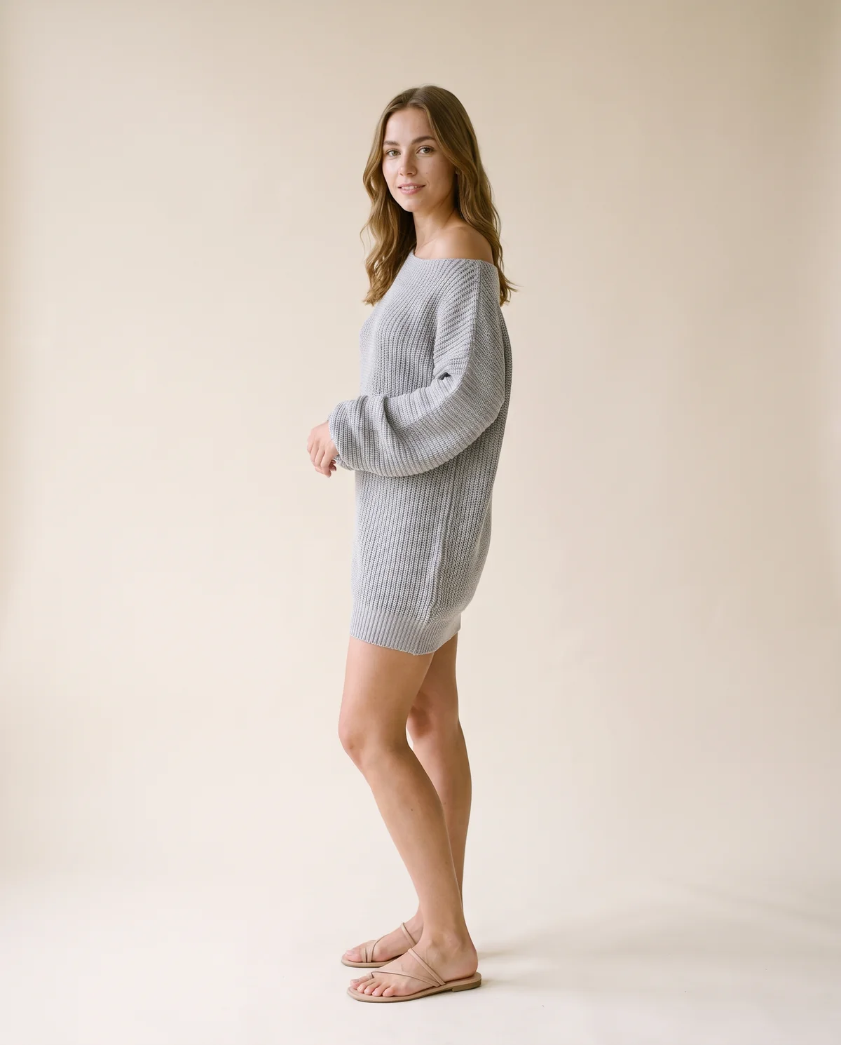 Off-Shoulder Chunky Knit Mini Dress in Light Grey, side view, worn by Ava
