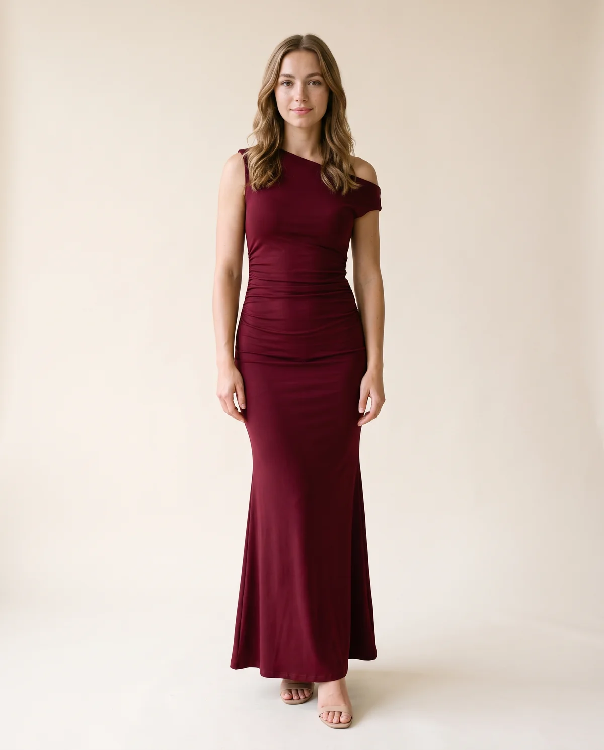 Asymmetric Ruched Jersey Maxi Dress in Wine, front view, worn by Ava