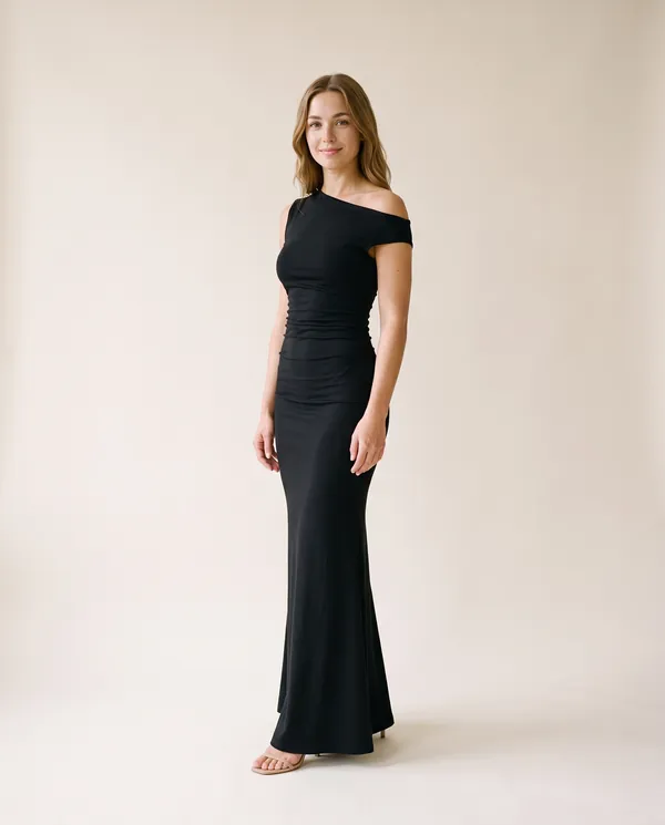 Asymmetric Ruched Jersey Maxi Dress in Black, side view, worn by Ava