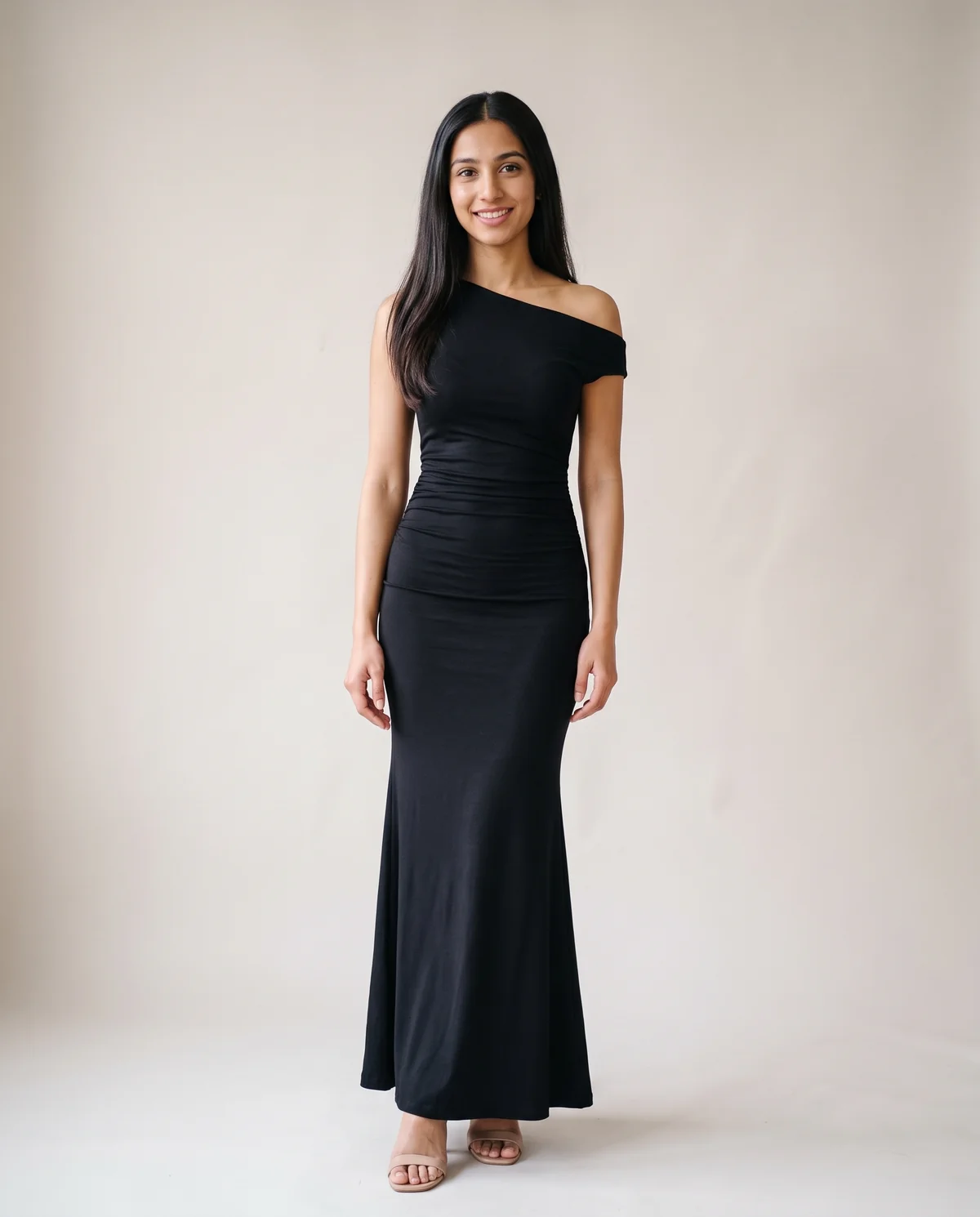 Asymmetric Ruched Jersey Maxi Dress in Black, front view, worn by Priya
