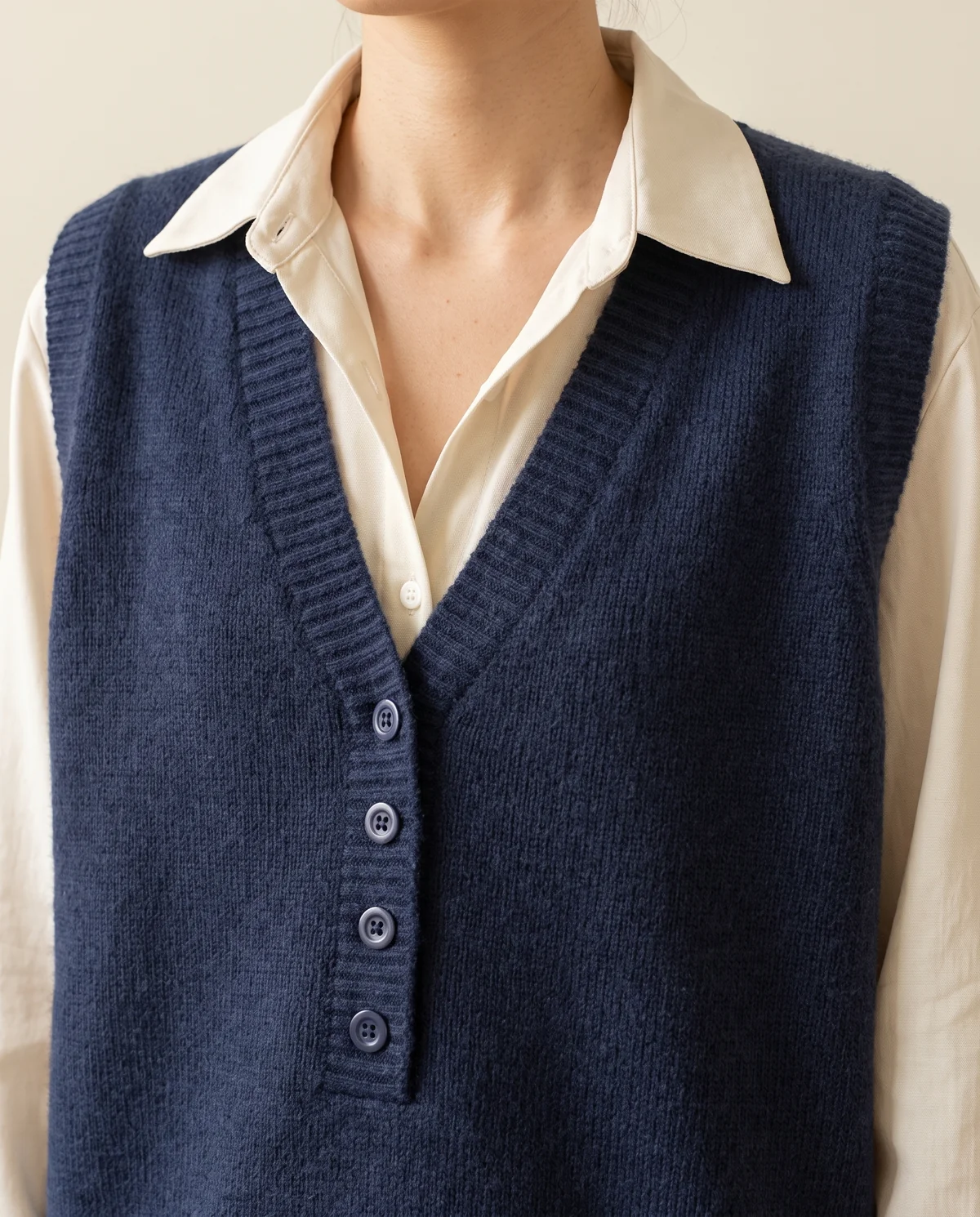 Navy V-Neck Knit Vest in Navy, close-up of the detail