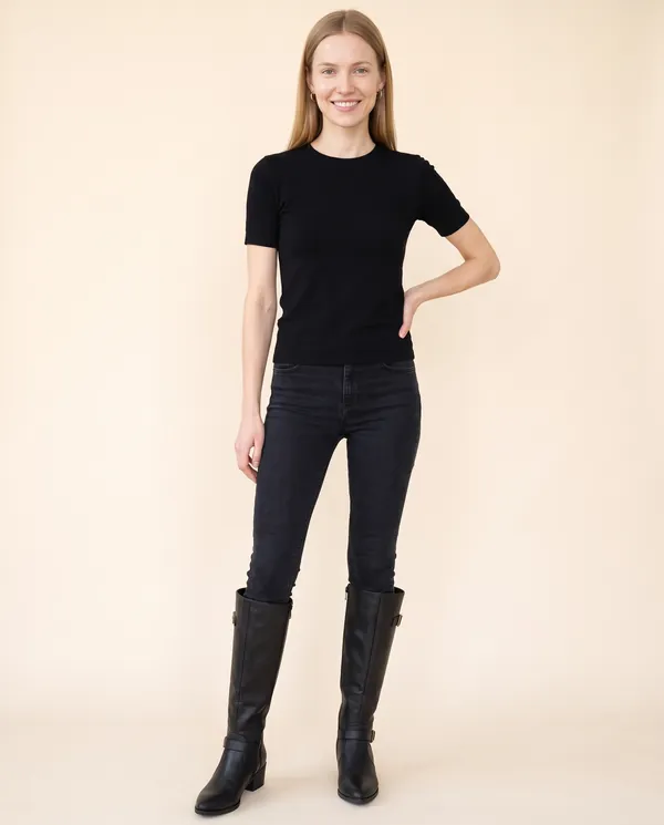 Buckle Block-Heel Knee-High Boot in Black, front view, worn by Maya