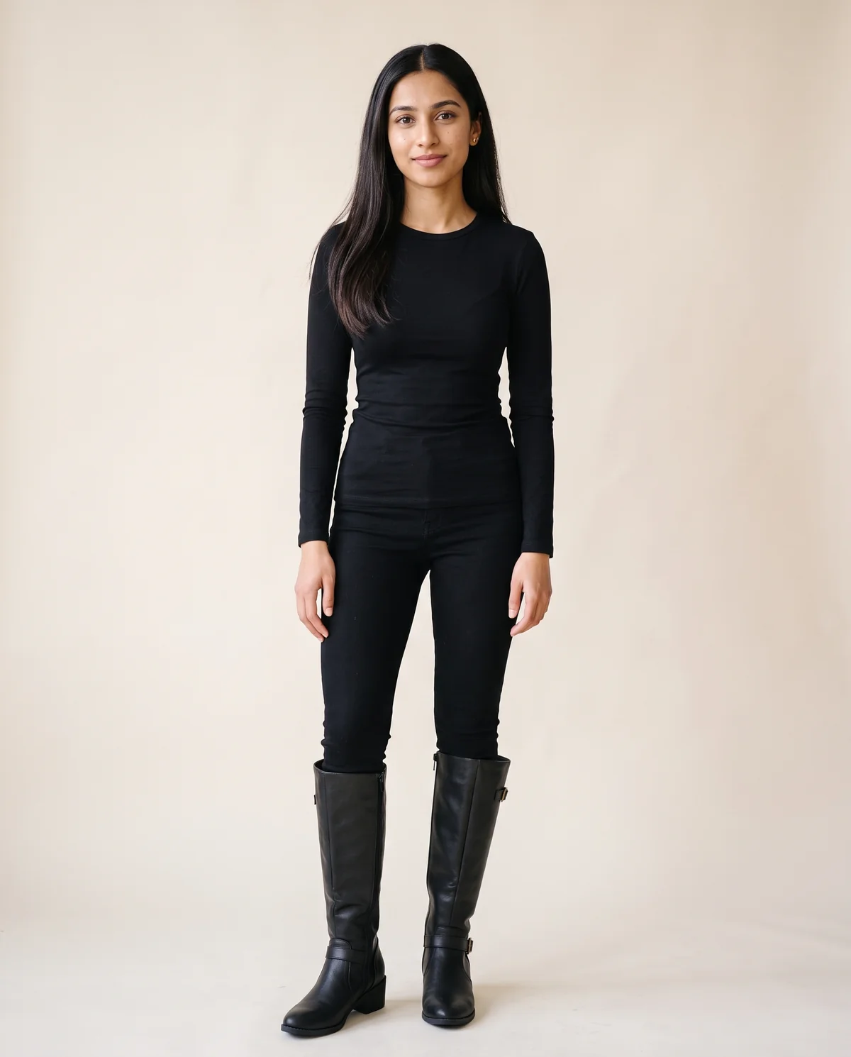 Buckle Block-Heel Knee-High Boot in Black, front view, worn by Priya