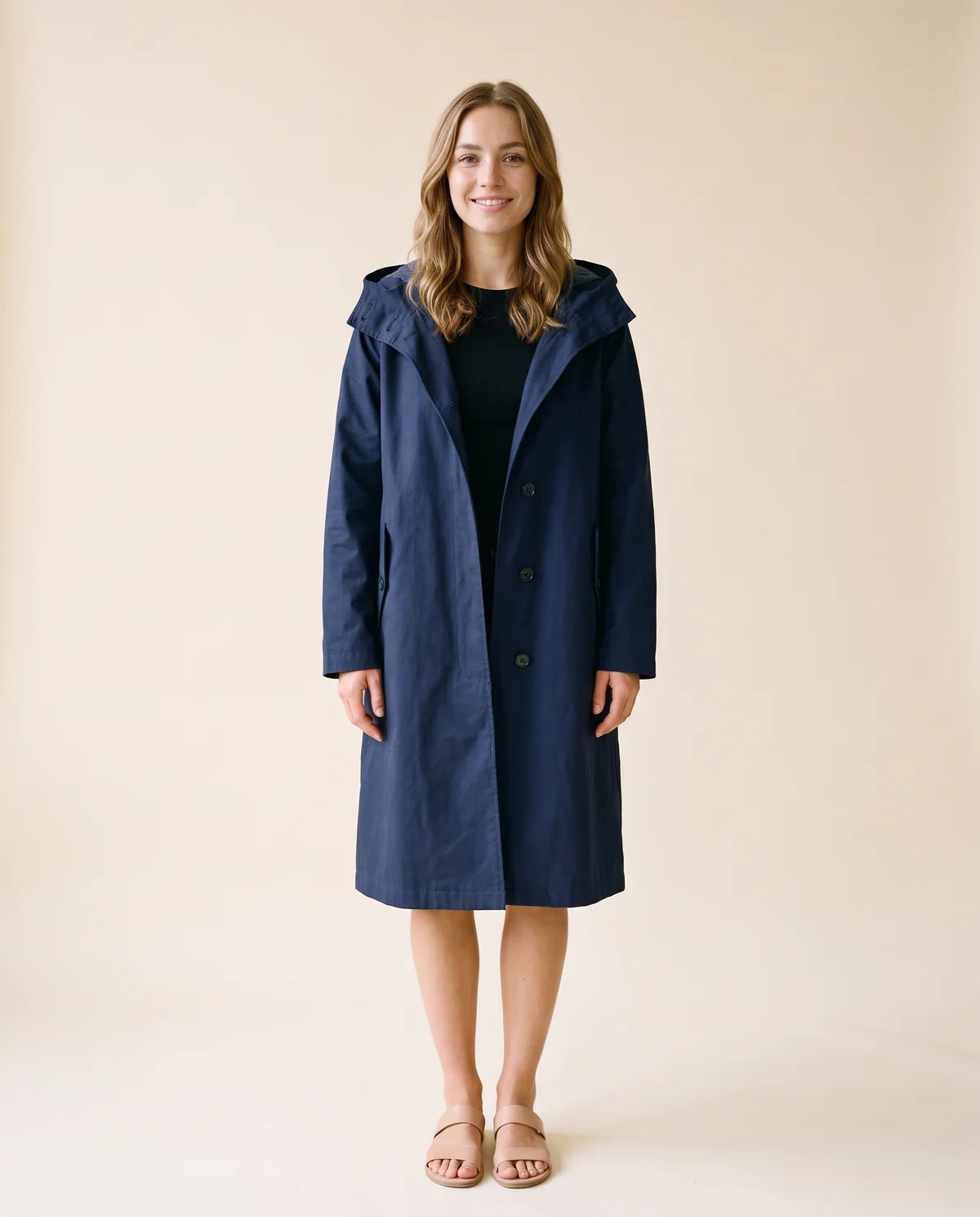 Hooded Trench Coat in Navy, front view, worn by Ava
