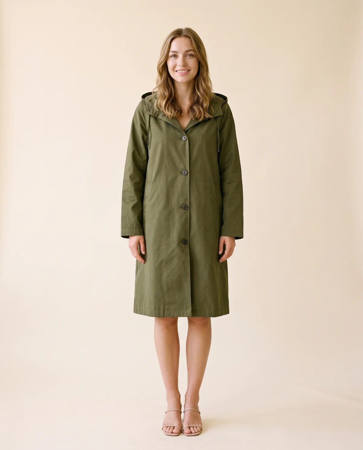 Hooded Trench Coat in Olive, front view, worn by Ava