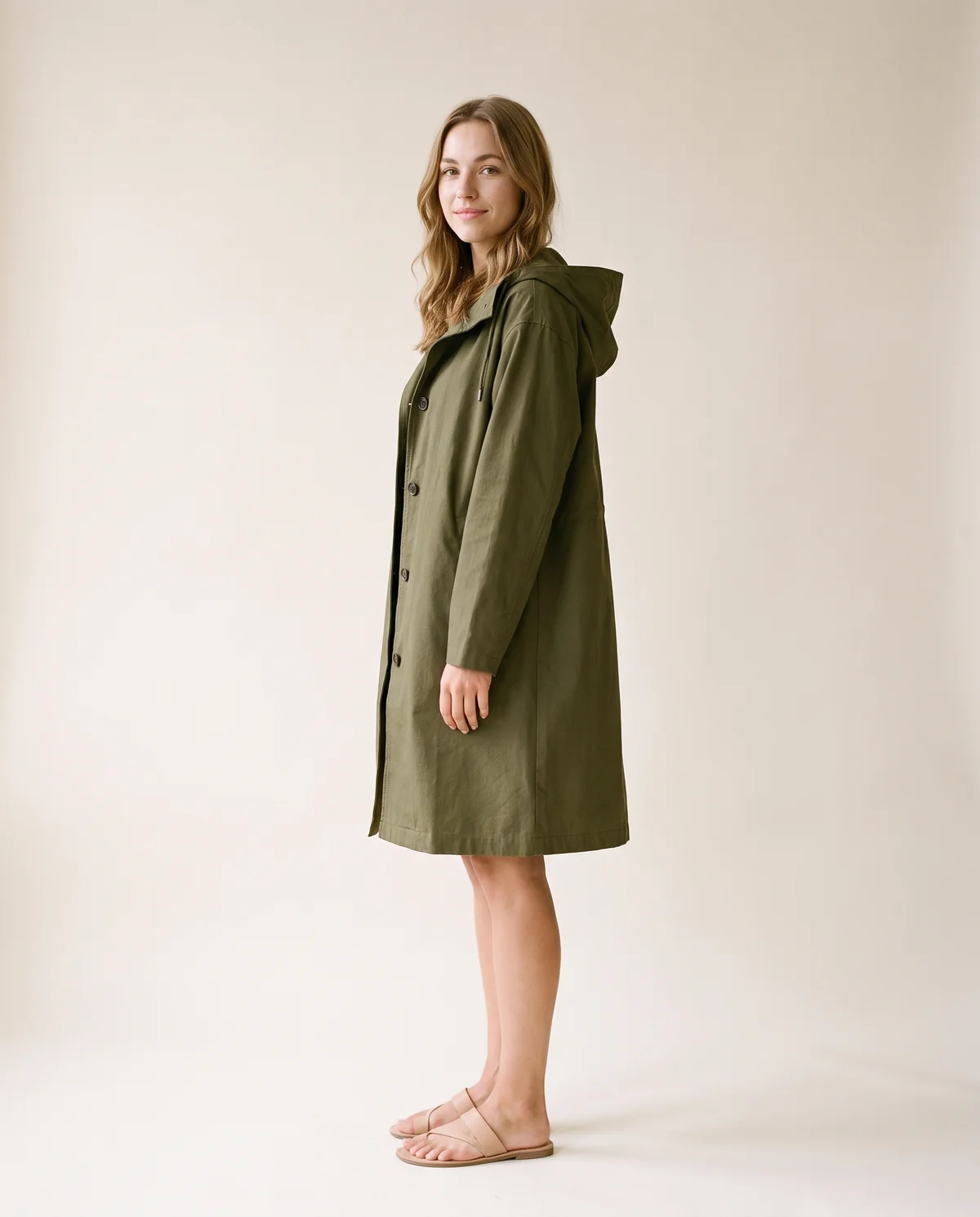 Hooded Trench Coat in Olive, side view, worn by Ava