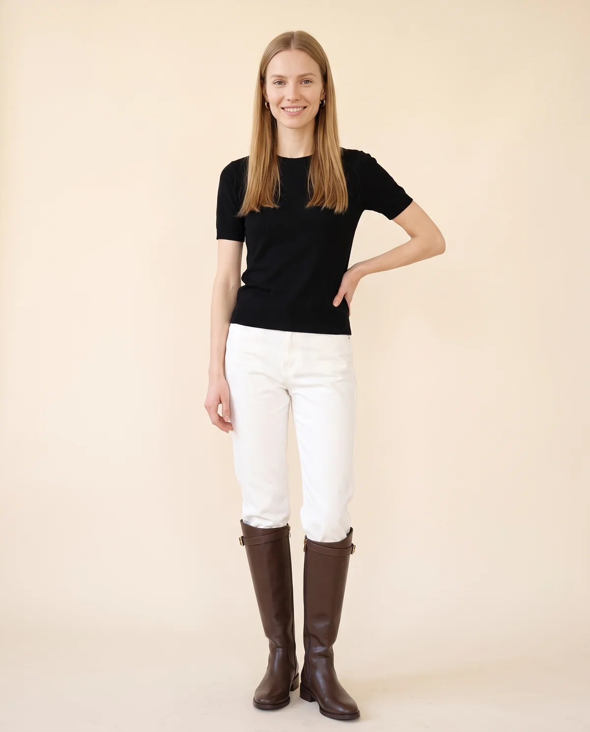 Buckle-Strap Riding Boot in Chocolate, front view, worn by Maya