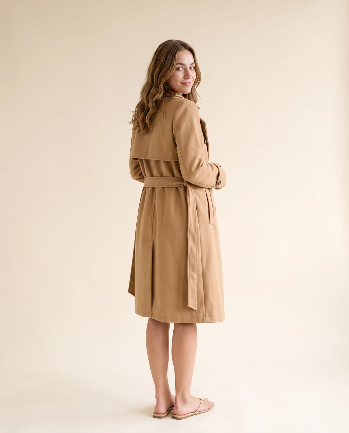 Double-Breasted Wrap Trench Coat in Camel, back view, worn by Ava