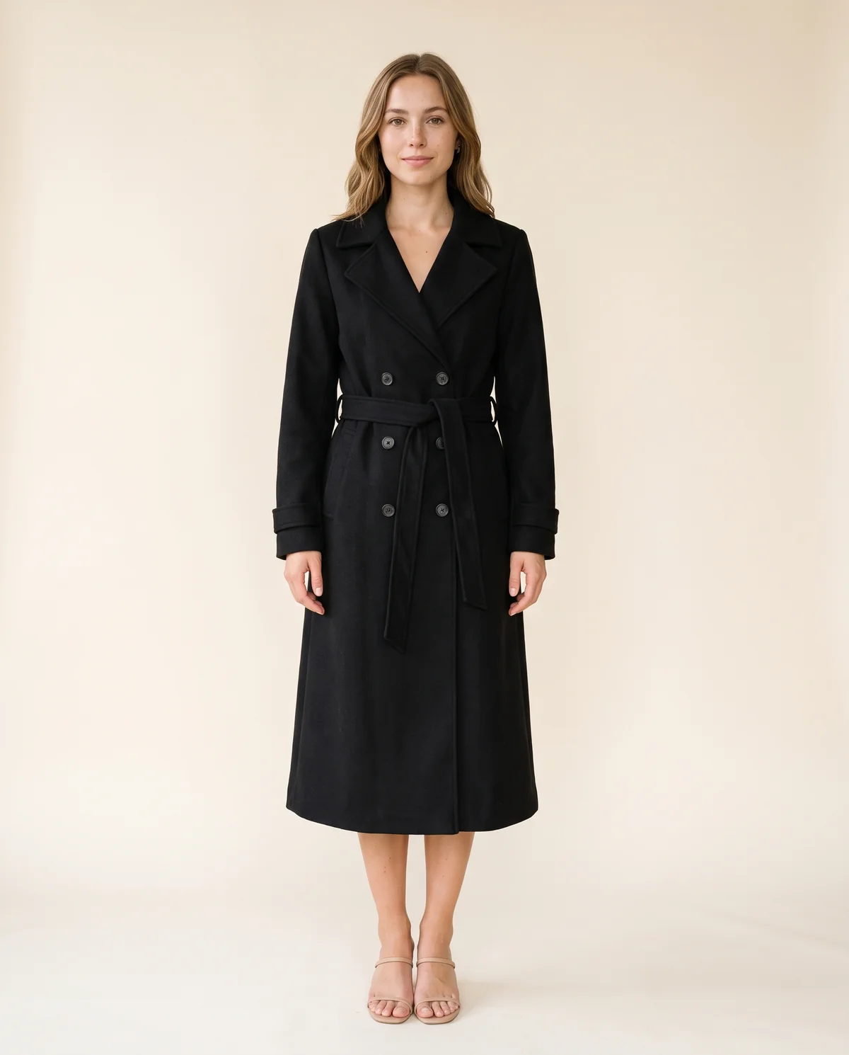 Long Belted Double-Breasted Trench in Black, front view, worn by Ava