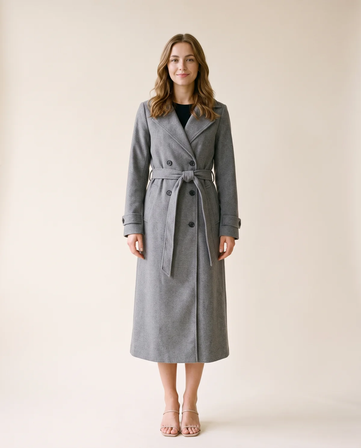 Long Belted Double-Breasted Trench in Grey, front view, worn by Ava