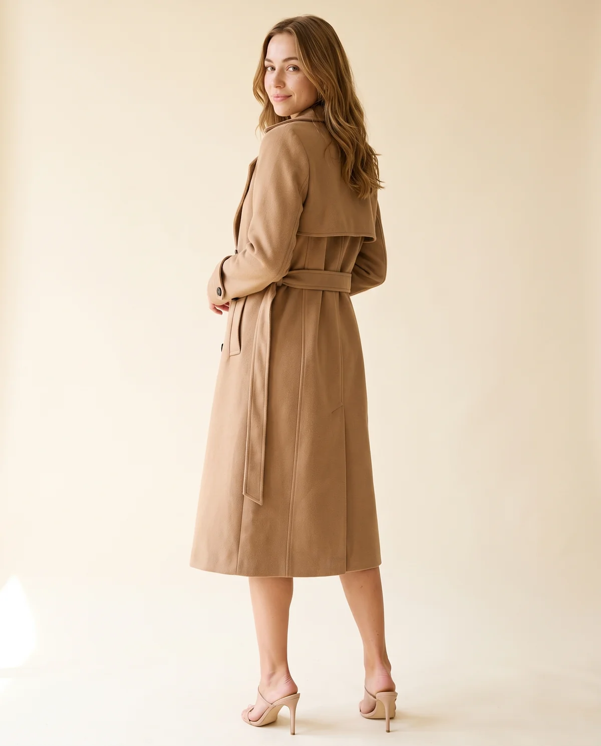 Long Belted Double-Breasted Trench in Camel, back view, worn by Ava